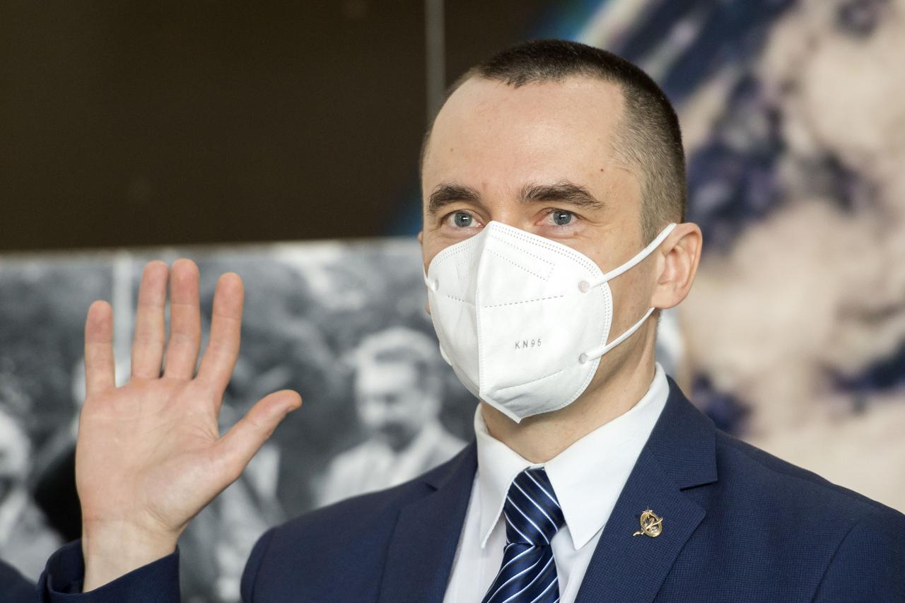 Expedition 65 prime crew member Russian cosmonaut Pyotr Dubrov of Roscosmos waves during a press conference prior to his launch from the Baikonur Cosmodrome in Kazakhstan, Wednesday, March 24, 2021 at the Gagarin Cosmonaut Training Center (GCTC) in Star City, Russia. Photo Credit: (NASA/GCTC/Irina Spector)