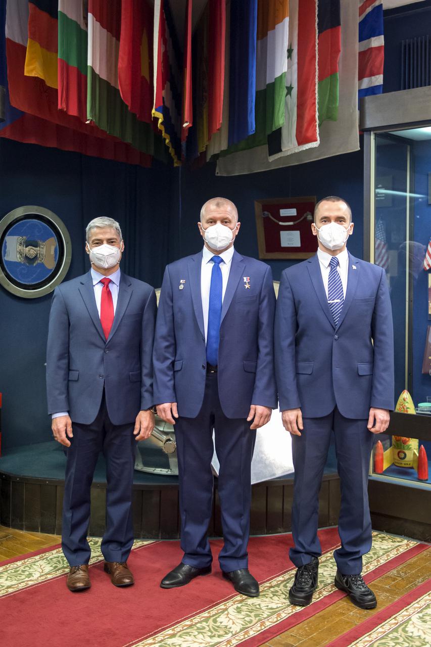 Expedition 65 crew members NASA astronaut Mark Vande Hei, left, Russian cosmonaut Oleg Novitskiy of Roscosmos, center, and Russian cosmonaut Pyotr Dubrov of Roscosmos, pose for a photo after a press conference prior to their launch from the Baikonur Cosmodrome, Wednesday, March 24, 2021 at the Gagarin Cosmonaut Training Center (GCTC) in Star City, Russia. Photo Credit: (NASA/GCTC/Irina Spector)