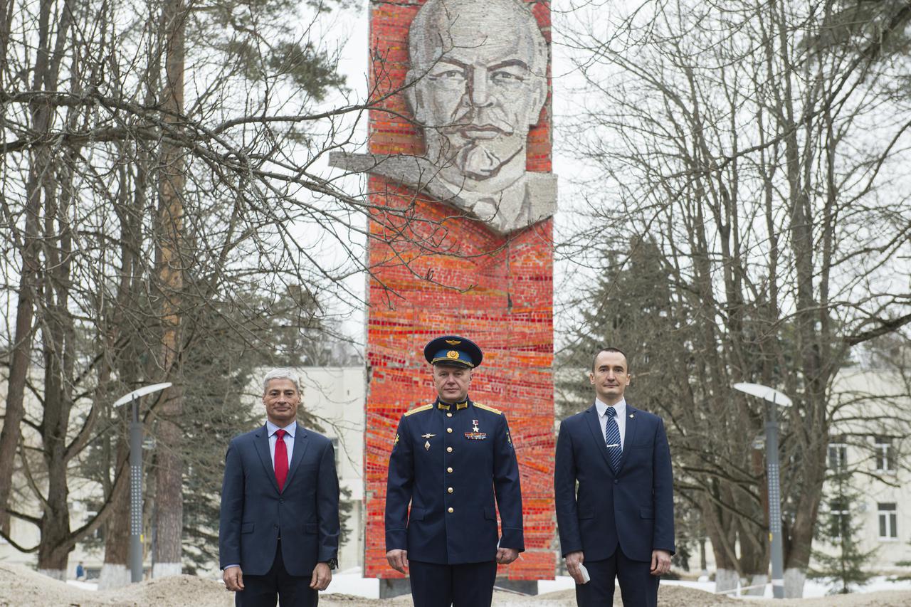 Expedition 65 prime crew members, NASA astronaut Mark Vande Hei, left, Russian cosmonaut Oleg Novitskiy of Roscosmos, center, and Russian cosmonaut Pyotr Dubrov of Roscosmos, right, pose for a photo during an official farewell ceremony prior to their departure to Baikonur for launch from the Baikonur Cosmodrome, Friday, March 26, 2021, at the Gagarin Cosmonaut Training Center (GCTC) in Star City, Russia. Photo Credit: (NASA/GCTC/Andrey Shelepin)