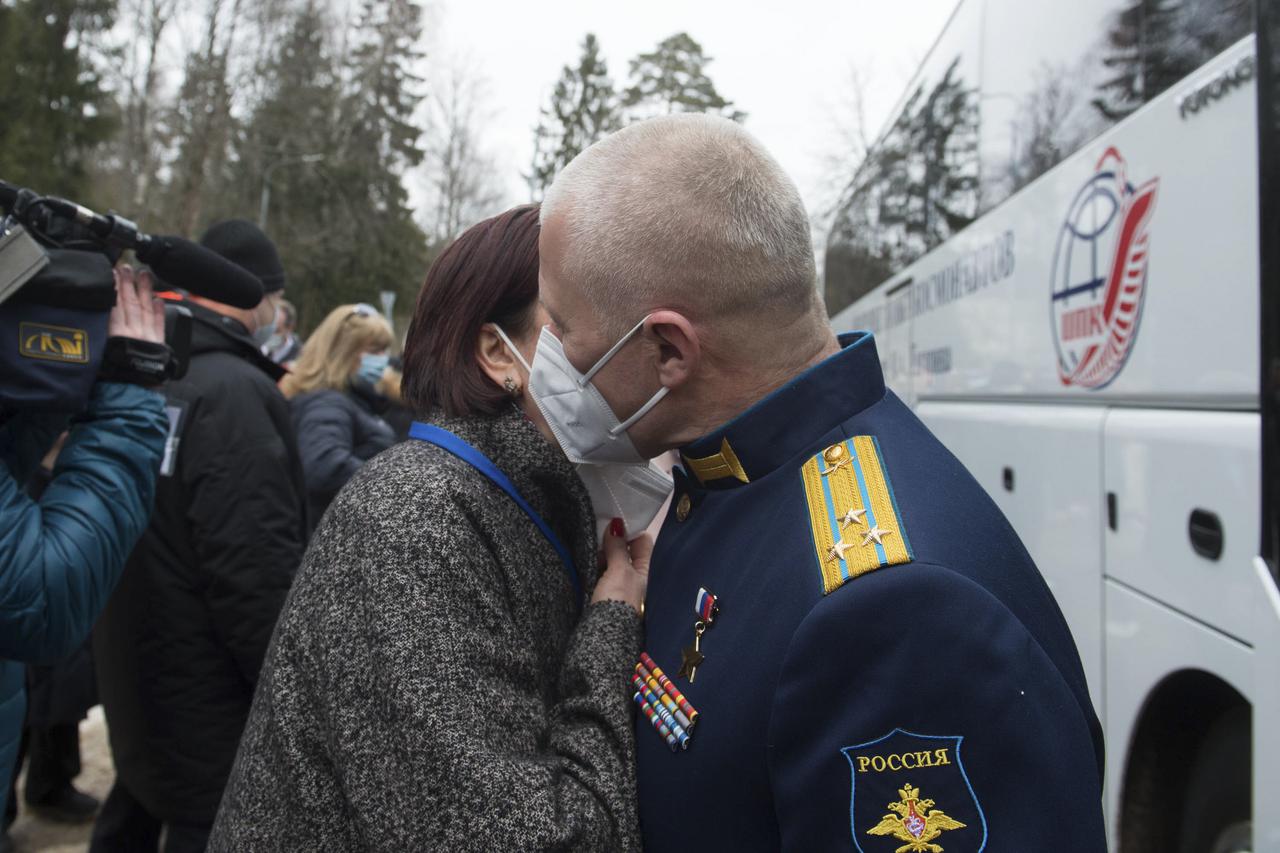 Family of Expedition 65 prime crew member, Russian cosmonaut Oleg Novitskiy of Roscosmos, bids him farewell prior to his departure to Baikonur for launch from the Baikonur Cosmodrome, Friday, March 26, 2021 at the Gagarin Cosmonaut Training Center (GCTC) in Star City, Russia. Photo Credit: (NASA/GCTC/Andrey Shelepin)