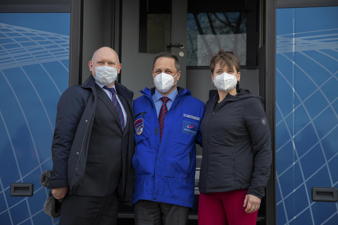 Expedition 65 backup crew members, Oleg Artemyev of Roscosmos, left, Anton Shkaplerov of Roscosmos, center and NASA astronaut Anne McClain, pose for a photo after arriving in Baikonur, Kazakhstan from the Gagarin Cosmonaut Training Center (GCTC), Friday, March 26, 2021. The prime crew is scheduled to launch from the Baikonur Cosmodrome on a Soyuz rocket April 9. Photo Credit: (NASA/GCTC/Irina Spector)