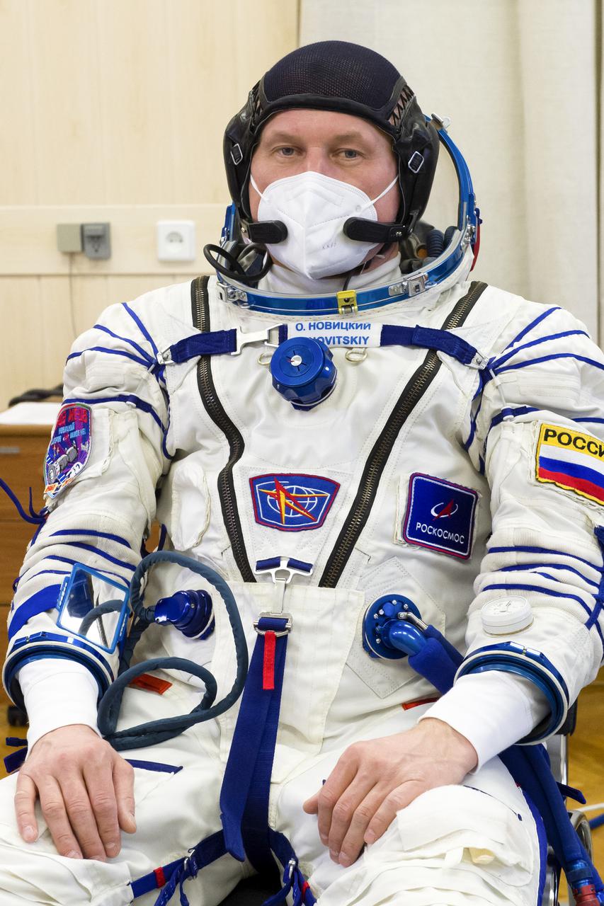 Expedition 65 prime crew member Oleg Novitskiy of Roscosmos is seen in his Sokol suit during a fit check to prepare for launch with fellow Russian cosmonaut Pyotr Dubrov of Roscosmos, and NASA astronaut Mark Vande Hei, Saturday, March 27, 2021 at the Baikonur Cosmodrome in Kazakhstan. They are scheduled to launch on a Soyuz rocket April 9. Photo Credit: (NASA/GCTC/Irina Spector)
