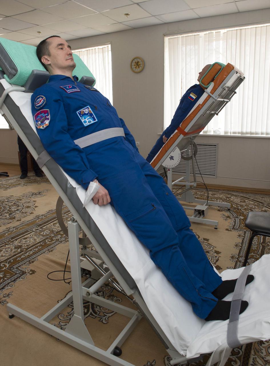 Expedition 65 prime crew member Russian cosmonaut Pyotr Dubrov of Roscosmos takes part in tilt table training Saturday, April 3, 2021, at the Cosmonaut Hotel in Baikonur, Kazakhstan. Dubrov, Oleg Novitskiy of Roscosmos, and NASA astronaut Mark Vande Hei, are scheduled to launch to the International Space Station aboard the Soyuz MS-18 spacecraft on April 9. Photo Credit: (NASA/GCTC/Irina Spector)