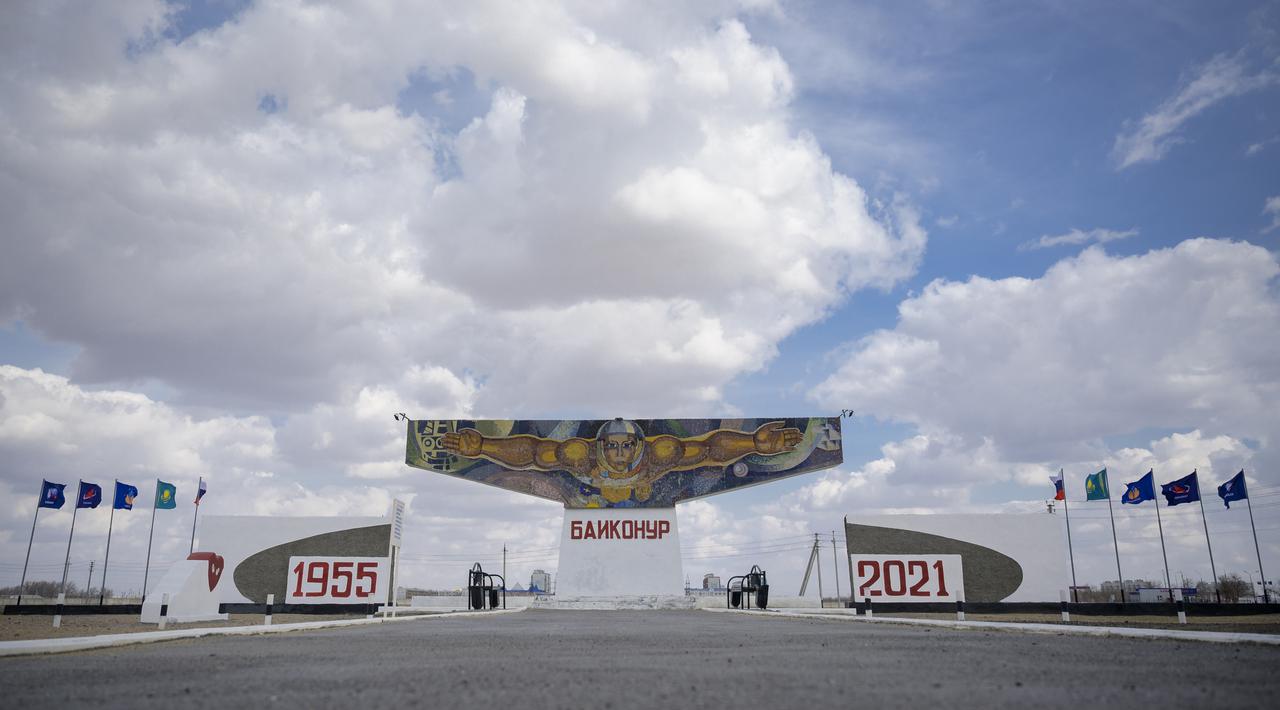 A mosaic sign welcomes visitors outside the town of Baikonur, Kazakhstan, Monday, April 5, 2021. NASA team members arrived in Baikonur, Kazakhstan in advance of the April 9, MS-18 spacecraft launch with Expedition 65 crewmembers Mark Vande Hei of NASA, Pyotr Dubrov and Oleg Novitskiy of Roscosmos. Photo Credit: (NASA/Bill Ingalls)