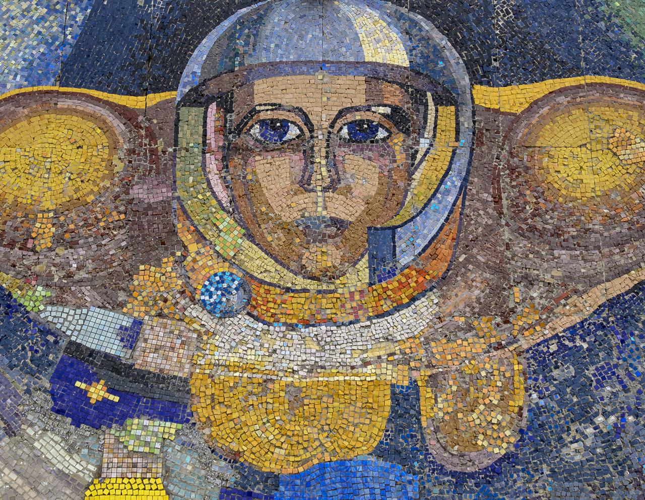 A mosaic sign welcomes visitors outside the town of Baikonur, Kazakhstan, Monday, April 5, 2021. NASA team members arrived in Baikonur, Kazakhstan in advance of the April 9, MS-18 spacecraft launch with Expedition 65 crewmembers Mark Vande Hei of NASA, Pyotr Dubrov and Oleg Novitskiy of Roscosmos. Photo Credit: (NASA/Bill Ingalls)