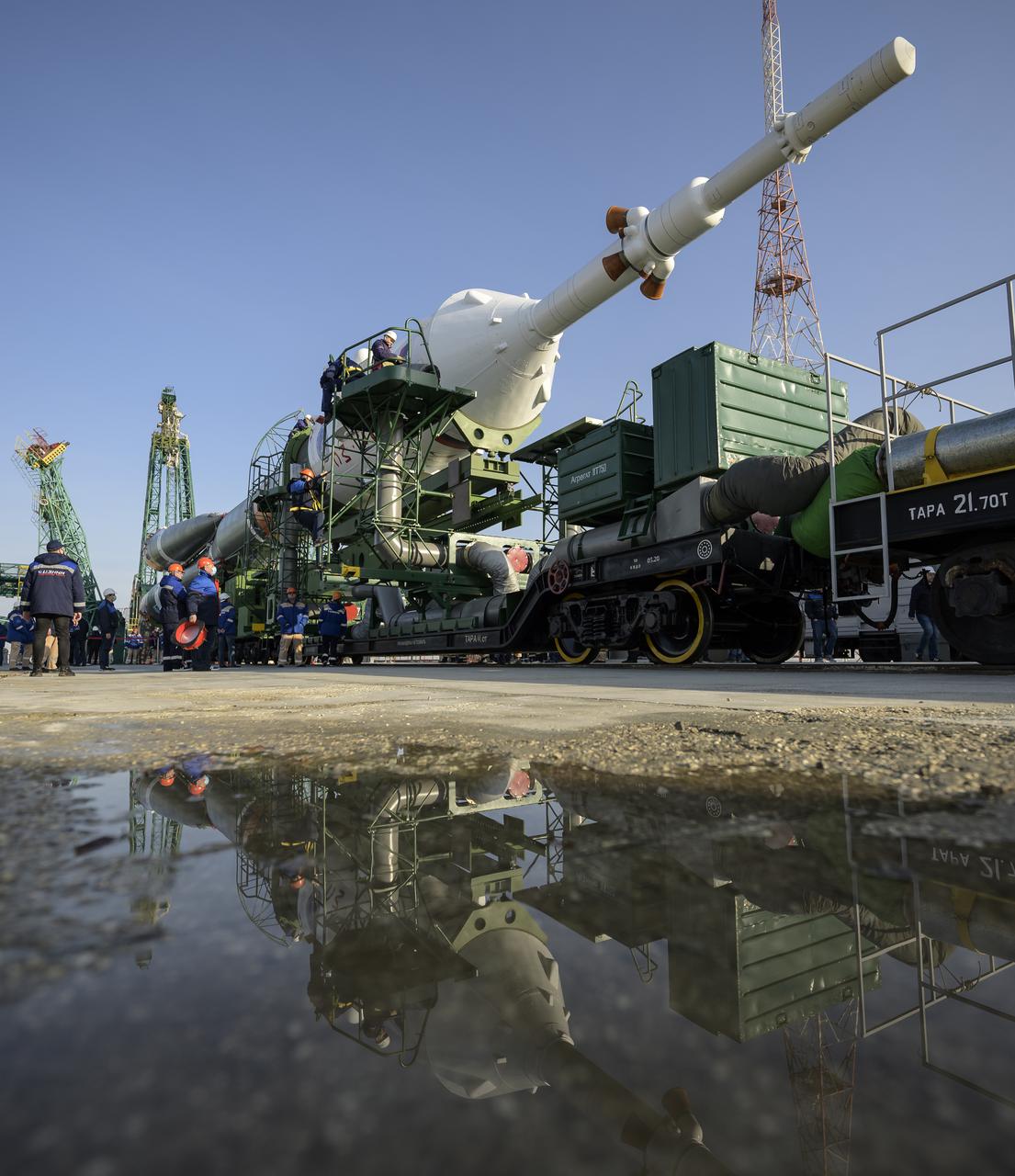 The Soyuz rocket is rolled out by train to the launch pad at Site 31, Tuesday, April 6, 2021, at the Baikonur Cosmodrome in Kazakhstan. Expedition 65 NASA astronaut Mark Vande Hei, Roscosmos cosmonauts Pyotr Dubrov and Oleg Novitskiy are scheduled to launch aboard their Soyuz MS-18 spacecraft on April 9.  Photo Credit: (NASA/Bill Ingalls)