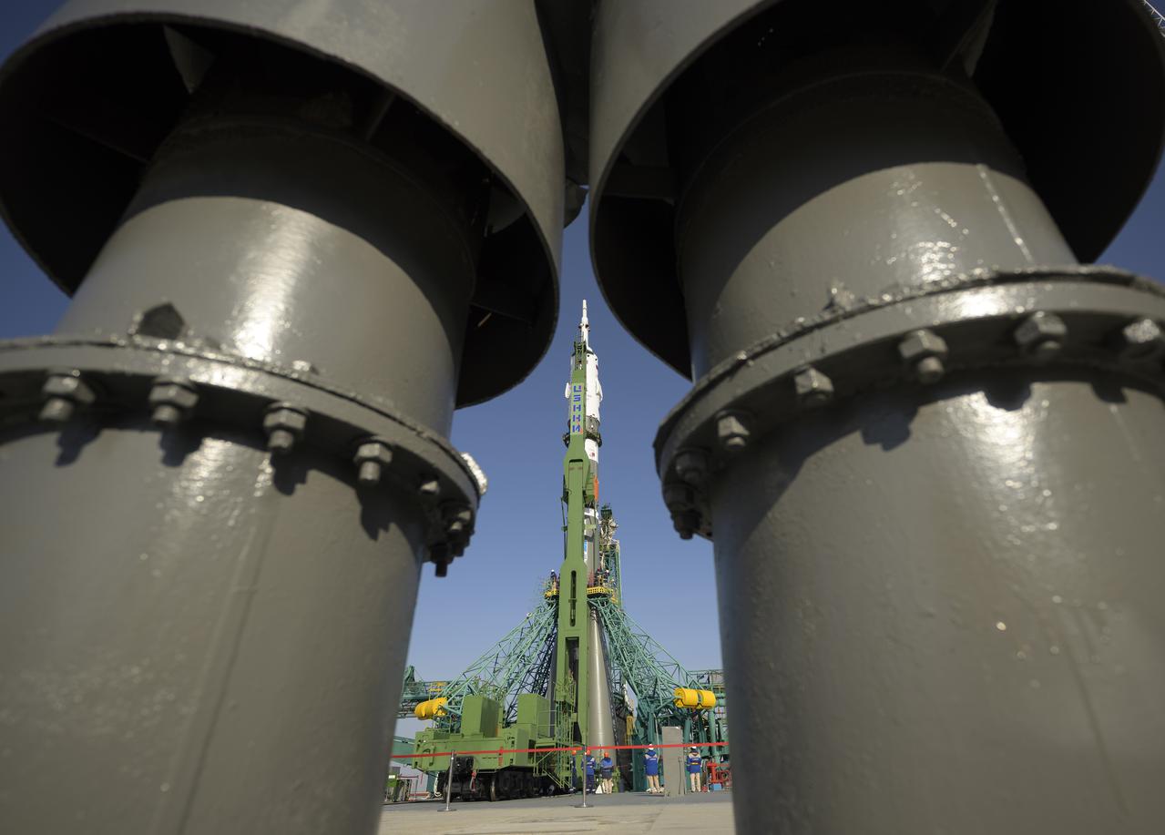 The Soyuz rocket is raised vertical, Tuesday, April 6, 2021, at the Site 31 launch pad of the Baikonur Cosmodrome in Kazakhstan. Expedition 65 NASA astronaut Mark Vande Hei, Roscosmos cosmonauts Pyotr Dubrov and Oleg Novitskiy are scheduled to launch aboard their Soyuz MS-18 spacecraft on April 9. Photo Credit: (NASA/Bill Ingalls)