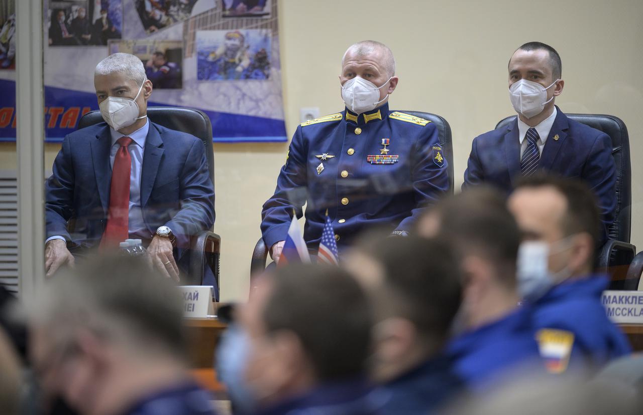 Expedition 65 NASA astronaut Mark Vande Hei, left, Roscosmos cosmonauts Oleg Novitskiy and Pyotr Dubrov, right, are seen during the State Commission meeting to approve the Soyuz launch of Expedition 65 to the International Space Station, Thursday, April 8, 2021 at the Cosmonaut Hotel in Baikonur, Kazakhstan. The trio are scheduled to launch to the International Space Station aboard the Soyuz MS-18 spacecraft on April 9. Photo Credit: (NASA/Bill Ingalls)