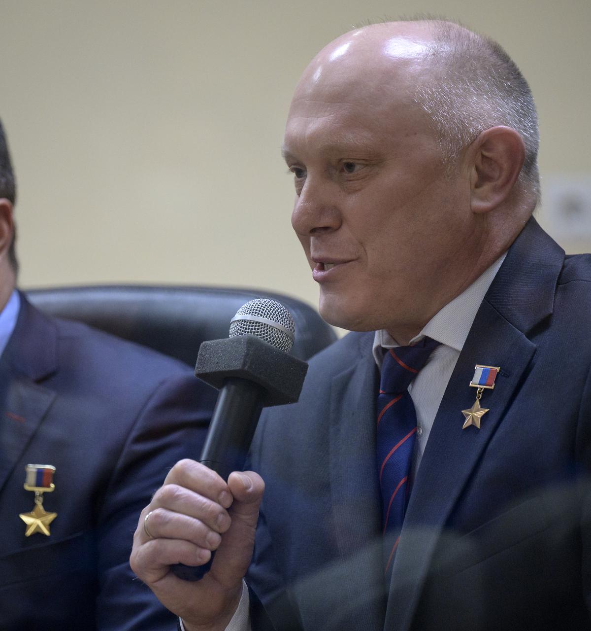 Expedition 65 backup crew member Oleg Artemyev of Roscosmos is seen during the State Commission meeting to approve the Soyuz launch of Expedition 65 to the International Space Station, Thursday, April 8, 2021 at the Cosmonaut Hotel in Baikonur, Kazakhstan. Expedition 65 NASA astronaut Mark Vande Hei, Roscosmos cosmonauts Pyotr Dubrov and Oleg Novitskiy, are scheduled to launch to the International Space Station aboard the Soyuz MS-18 spacecraft on April 9. Photo Credit: (NASA/Bill Ingalls)