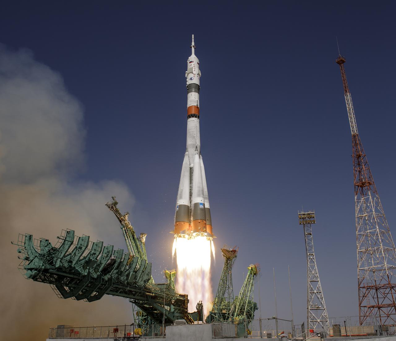 The Soyuz MS-18 rocket is launched with Expedition 65 NASA astronaut Mark Vande Hei, Roscosmos cosmonauts Pyotr Dubrov and Oleg Novitskiy, Friday, April 9, 2021, at the Baikonur Cosmodrome in Kazakhstan. Photo Credit: (NASA/Bill Ingalls)