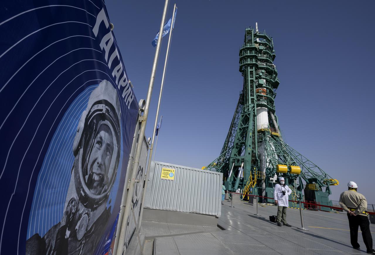A banner celebrating the 60th anniversary of the launch of Yuri Gagarin is seen at the site 31 launch pad prior to boarding Expedition 65 NASA astronaut Mark Vande Hei, Russian cosmonauts Oleg Novitskiy and Pyotr Dubrov, Friday, April 9, 2021 at the Baikonur Cosmodrome in Kazakhstan. Launch of the Soyuz rocket sent the trio on a mission to the International Space Station. Photo Credit: (NASA/Bill Ingalls)