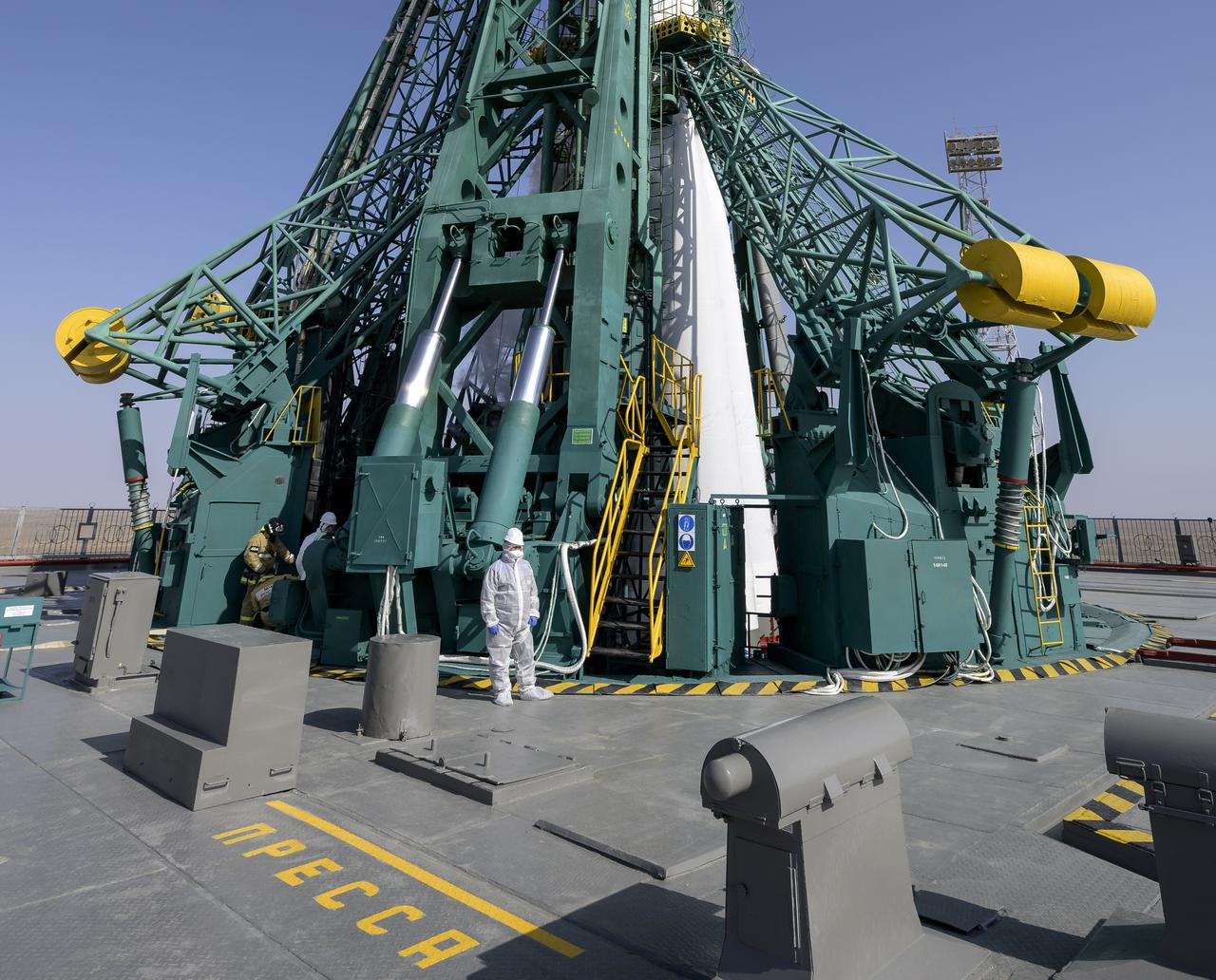 Support teams wait at the Soyuz Rocket for boarding of Expedition 65 NASA astronaut Mark Vande Hei, Russian cosmonauts Oleg Novitskiy and Pyotr Dubrov, Friday, April 9, 2021 at the Baikonur Cosmodrome in Kazakhstan. Launch of the Soyuz rocket sent the trio on a mission to the International Space Station. Photo Credit: (NASA/Bill Ingalls)