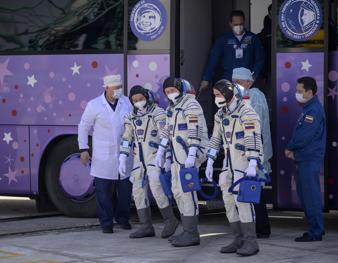 Expedition 65 NASA astronaut Mark Vande Hei, left, Russian cosmonauts Oleg Novitskiy, center, and Pyotr Dubrov arrive at the launch pad to board the Soyuz MS-18 spacecraft for launch, Friday, April 9, 2021 at the Baikonur Cosmodrome in Kazakhstan. Launch of the Soyuz rocket sent the trio on a mission to the International Space Station. Photo Credit: (NASA/Bill Ingalls)