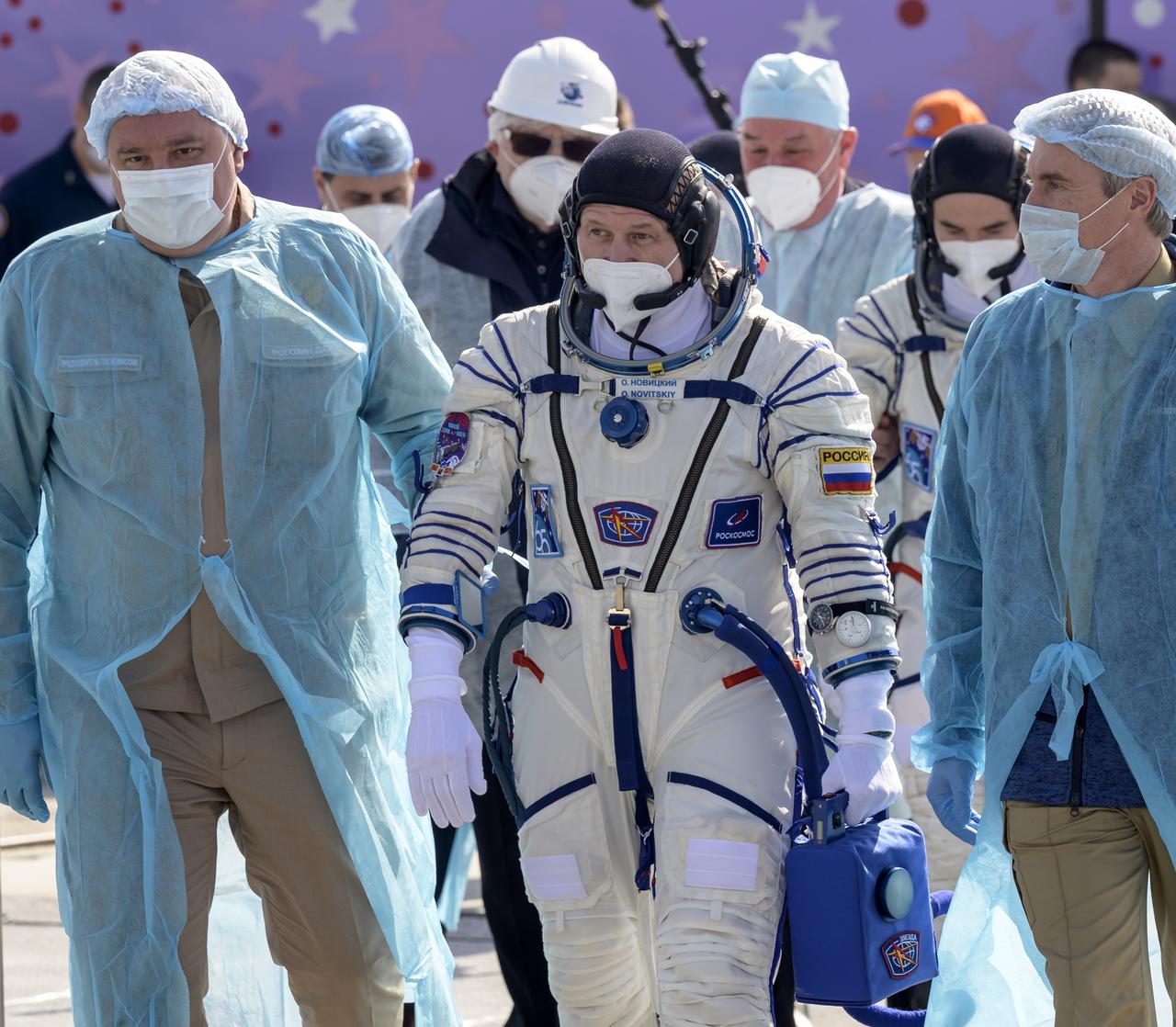 Expedition 65 Russian cosmonaut Oleg Novitskiy walks to board the Soyuz MS-18 spacecraft for launch, Friday, April 9, 2021 at the Baikonur Cosmodrome in Kazakhstan. Launch of the Soyuz rocket sent Novitskiy, NASA astronaut Mark Vande Hei and Russian cosmonaut Pyotr Dubrov on a mission to the International Space Station. Photo Credit: (NASA/Bill Ingalls)