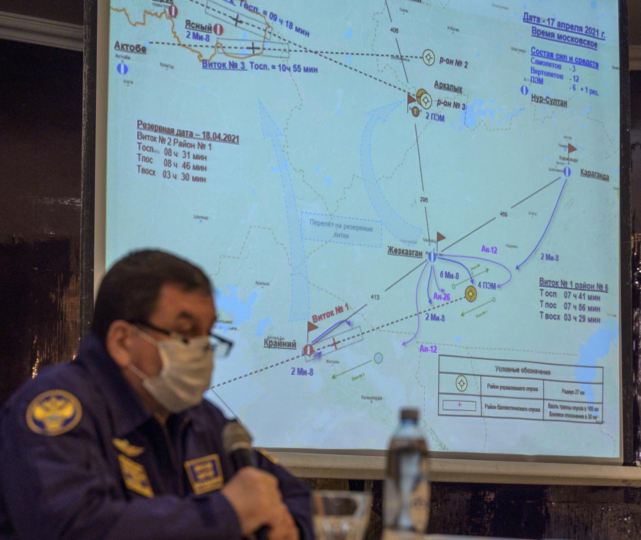 NASA, Roscosmos, and Russian Search and Recovery Forces meet at the Cosmonaut Hotel in Karaganda, Kazakhstan to discuss the readiness for the landing of Expedition 64 crew members Kate Rubins of NASA, Sergey Ryzhikov and Sergey Kud-Sverchkov of Roscosmos, Thursday, April 15, 2021, at the Cosmonaut Hotel in Karaganda. Rubins, Ryzhikov and Kud-Sverchkov will be returning after 185 days in space having served as Expedition 63-64 crew members onboard the International Space Station. Photo Credit: NASA/Bill Ingalls