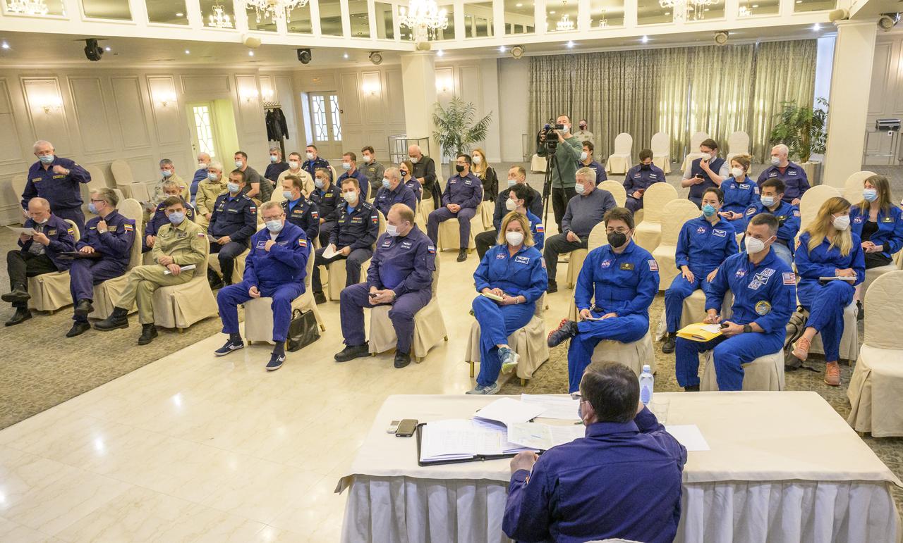 NASA, Roscosmos, and Russian Search and Recovery Forces meet at the Cosmonaut Hotel in Karaganda, Kazakhstan to discuss the readiness for the landing of Expedition 64 crew members Kate Rubins of NASA, Sergey Ryzhikov and Sergey Kud-Sverchkov of Roscosmos, Thursday, April 15, 2021, at the Cosmonaut Hotel in Karaganda. Rubins, Ryzhikov and Kud-Sverchkov will be returning after 185 days in space having served as Expedition 63-64 crew members onboard the International Space Station. Photo Credit: NASA/Bill Ingalls