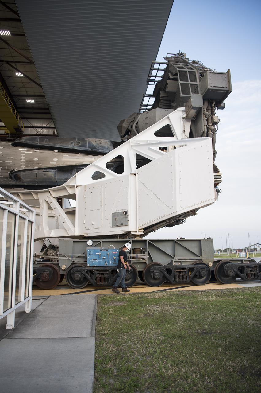 A SpaceX Falcon 9 rocket with the company's Crew Dragon spacecraft onboard is seen as it is rolled out of the horizontal integration facility at Launch Complex 39A as preparations continue for the Crew-2 mission, Friday, April 16, 2021, at NASA’s Kennedy Space Center in Florida. NASA’s SpaceX Crew-2 mission is the second crew rotation mission of the SpaceX Crew Dragon spacecraft and Falcon 9 rocket to the International Space Station as part of the agency’s Commercial Crew Program. NASA astronauts Shane Kimbrough and Megan McArthur, ESA (European Space Agency) astronaut Thomas Pesquet, and Japan Aerospace Exploration Agency (JAXA) astronaut Akihiko Hoshide are scheduled to launch at 6:11 a.m. ET on Thursday, April 22, from Launch Complex 39A at the Kennedy Space Center. Photo Credit: (NASA/Aubrey Gemignani)