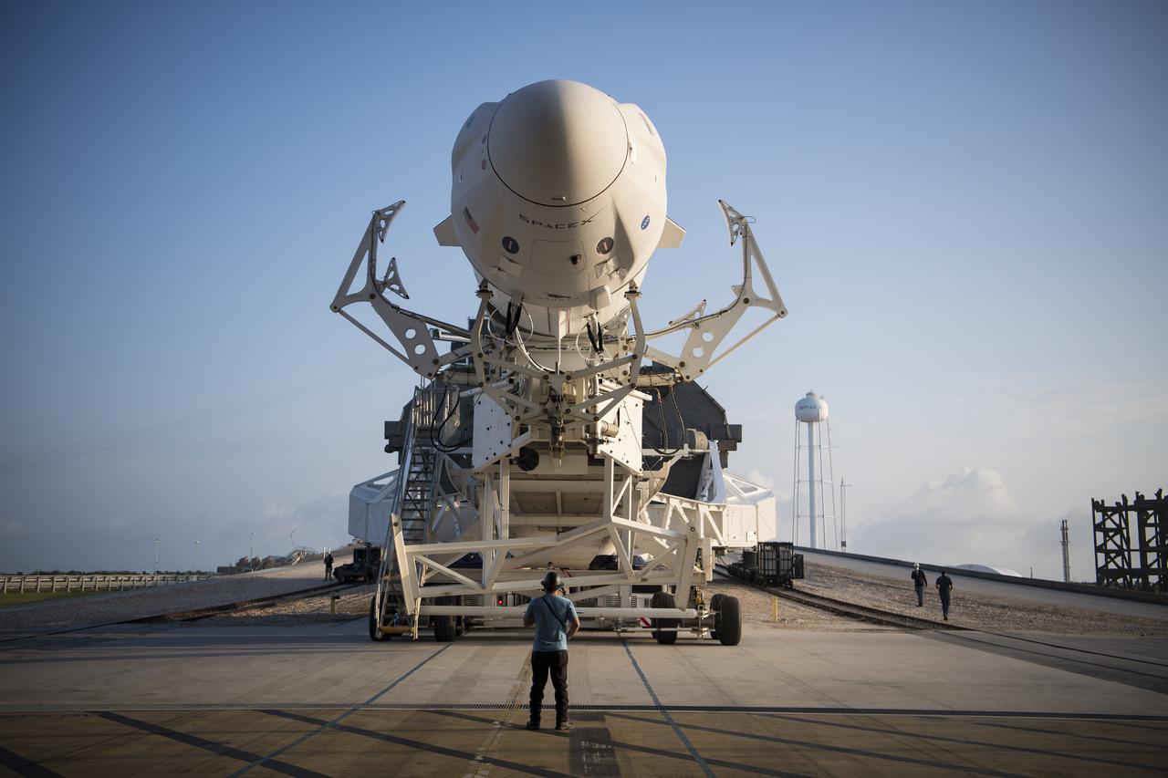 A SpaceX Falcon 9 rocket with the company's Crew Dragon spacecraft onboard is seen as it is rolled to Launch Complex 39A as preparations continue for the Crew-2 mission, Friday, April 16, 2021, at NASA’s Kennedy Space Center in Florida. NASA’s SpaceX Crew-2 mission is the second crew rotation mission of the SpaceX Crew Dragon spacecraft and Falcon 9 rocket to the International Space Station as part of the agency’s Commercial Crew Program. NASA astronauts Shane Kimbrough and Megan McArthur, ESA (European Space Agency) astronaut Thomas Pesquet, and Japan Aerospace Exploration Agency (JAXA) astronaut Akihiko Hoshide are scheduled to launch at 6:11 a.m. ET on Thursday, April 22, from Launch Complex 39A at the Kennedy Space Center. Photo Credit: (NASA/Aubrey Gemignani)