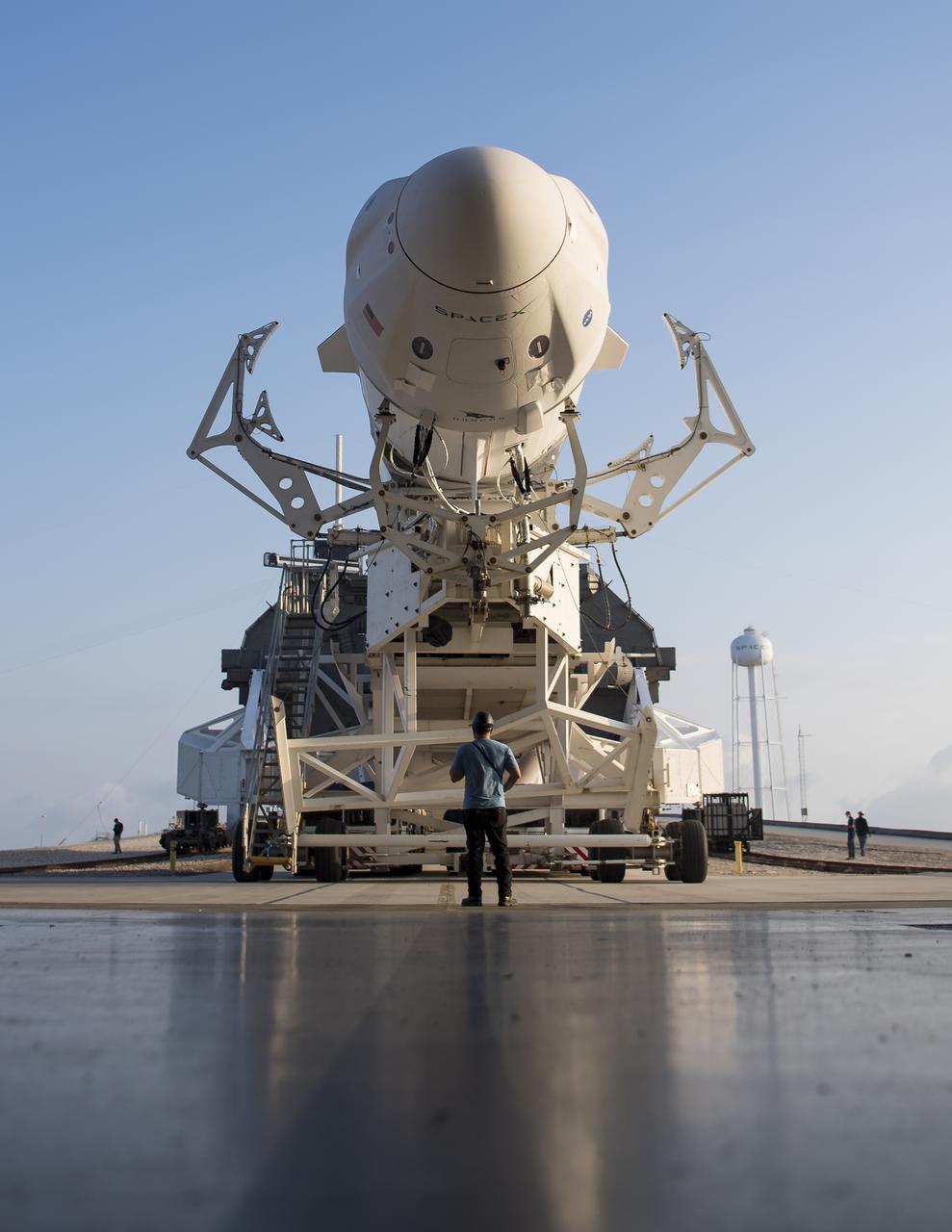 A SpaceX Falcon 9 rocket with the company's Crew Dragon spacecraft onboard is seen as it is rolled out of the horizontal integration facility at Launch Complex 39A as preparations continue for the Crew-2 mission, Friday, April 16, 2021, at NASA’s Kennedy Space Center in Florida. NASA’s SpaceX Crew-2 mission is the second crew rotation mission of the SpaceX Crew Dragon spacecraft and Falcon 9 rocket to the International Space Station as part of the agency’s Commercial Crew Program. NASA astronauts Shane Kimbrough and Megan McArthur, ESA (European Space Agency) astronaut Thomas Pesquet, and Japan Aerospace Exploration Agency (JAXA) astronaut Akihiko Hoshide are scheduled to launch at 6:11 a.m. ET on Thursday, April 22, from Launch Complex 39A at the Kennedy Space Center. Photo Credit: (NASA/Aubrey Gemignani)