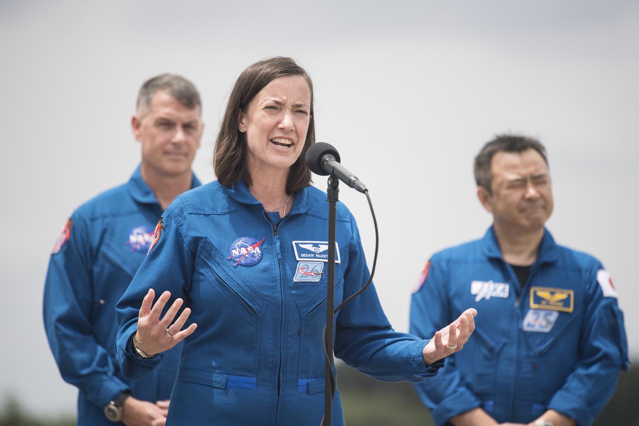 NASA astronaut Megan McArthur answers a question from the media after her and her crew mates NASA astronaut Shane Kimbrough, left, Japan Aerospace Exploration Agency (JAXA) astronaut, Akihiko Hoshide, right, and ESA (European Space Agency) astronaut Thomas Pesquet, not pictured, arrived at the Launch and Landing Facility at NASA’s Kennedy Space Center ahead of SpaceX’s Crew-2 mission, Friday, April 16, 2021, in Florida. NASA’s SpaceX Crew-2 mission is the second operational mission of the SpaceX Crew Dragon spacecraft and Falcon 9 rocket to the International Space Station as part of the agency’s Commercial Crew Program. Kimbrough, McArthur, Pesquet, and Hoshide are scheduled to launch at 6:11 a.m. ET on Thursday, April 22, from Launch Complex 39A at the Kennedy Space Center. Photo Credit: (NASA/Aubrey Gemignani)