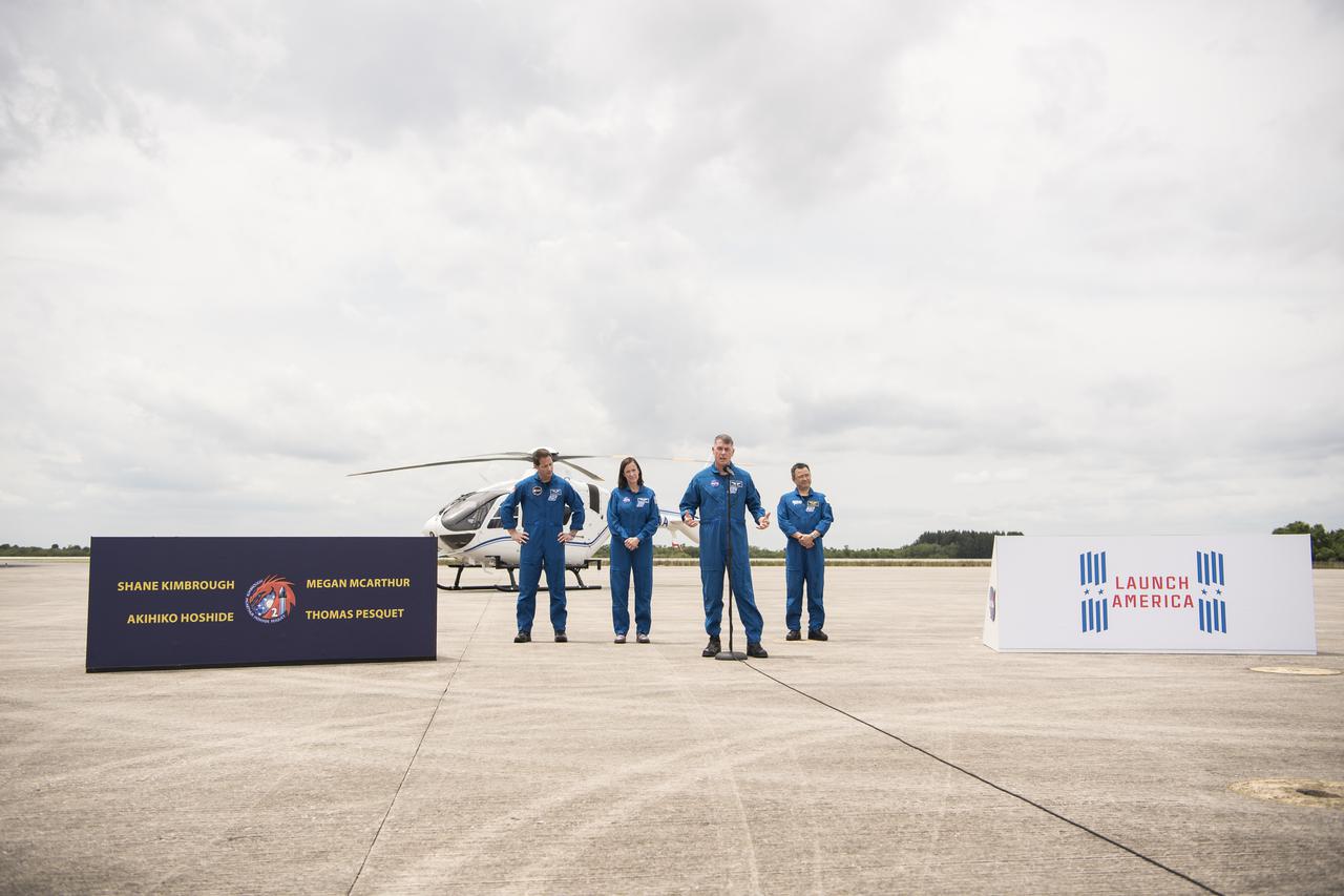 NASA astronaut Shane Kimbrough answers a question from media after he and his crew mates, ESA (European Space Agency) astronaut Thomas Pesquet, left, NASA astronaut Megan McArthur, second from left, and Japan Aerospace Exploration Agency (JAXA) astronaut Akihiko Hoshide, right, arrived at the Launch and Landing Facility at NASA’s Kennedy Space Center ahead of SpaceX’s Crew-2 mission, Friday, April 16, 2021, in Florida. NASA’s SpaceX Crew-2 mission is the second operational mission of the SpaceX Crew Dragon spacecraft and Falcon 9 rocket to the International Space Station as part of the agency’s Commercial Crew Program. Kimbrough, McArthur, Pesquet, and Hoshide are scheduled to launch at 6:11 a.m. ET on Thursday, April 22, from Launch Complex 39A at the Kennedy Space Center. Photo Credit: (NASA/Aubrey Gemignani)