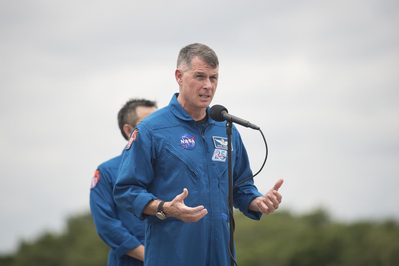 NASA astronaut Shane Kimbrough answers a question after he and his crew mates ESA (European Space Agency) astronaut Thomas Pesquet, NASA astronaut Megan McArthur, and Japan Aerospace Exploration Agency (JAXA) astronaut Akihiko Hoshide, arrived at the Launch and Landing Facility at NASA’s Kennedy Space Center ahead of SpaceX’s Crew-2 mission, Friday, April 16, 2021, in Florida. NASA’s SpaceX Crew-2 mission is the second operational mission of the SpaceX Crew Dragon spacecraft and Falcon 9 rocket to the International Space Station as part of the agency’s Commercial Crew Program. Kimbrough, McArthur, Pesquet, and Hoshide are scheduled to launch at 6:11 a.m. ET on Thursday, April 22, from Launch Complex 39A at the Kennedy Space Center. Photo Credit: (NASA/Aubrey Gemignani)