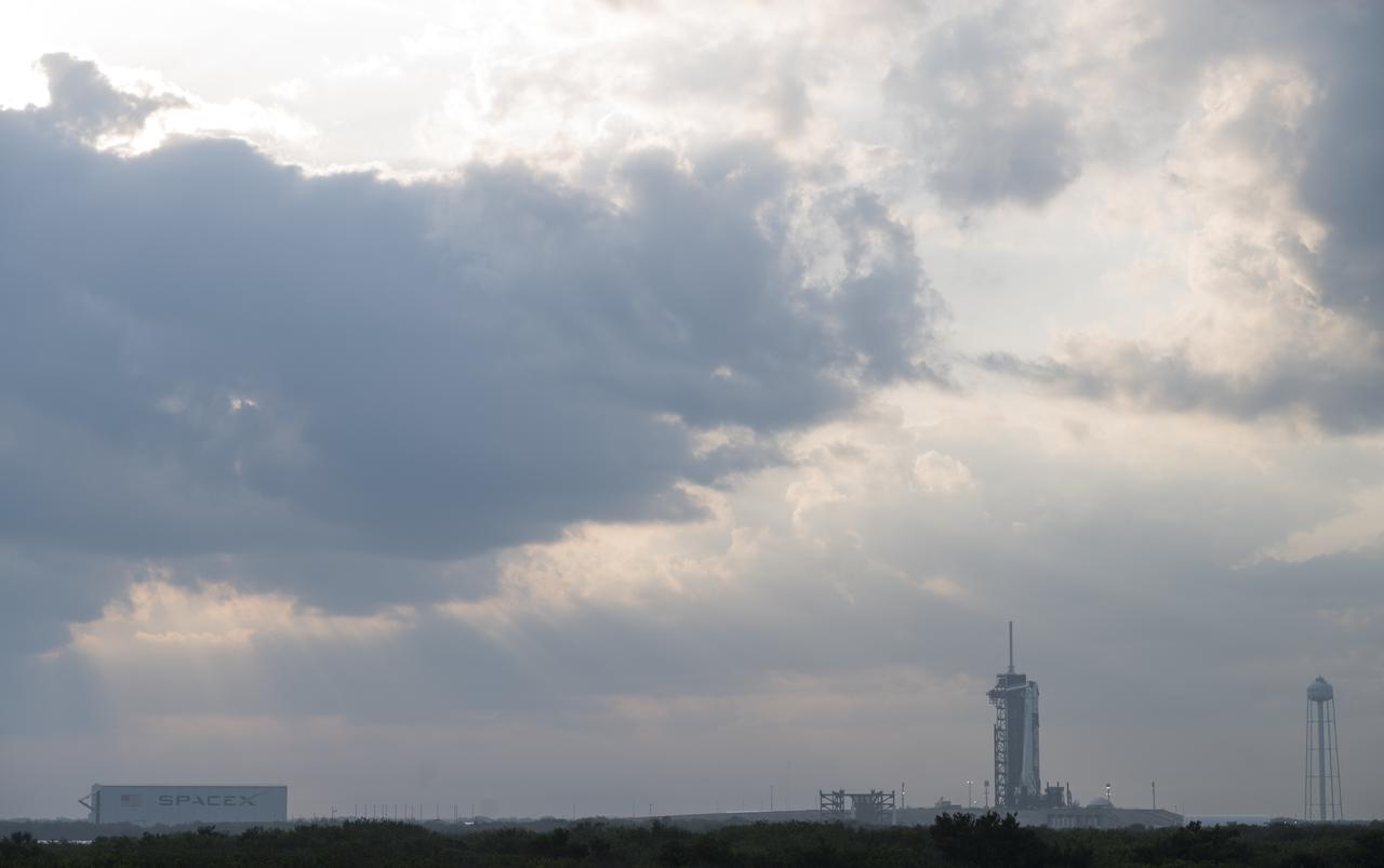 A SpaceX Falcon 9 rocket with the company's Crew Dragon spacecraft onboard is seen on the launch pad at Launch Complex 39A as preparations continue for the Crew-2 mission, Saturday, April 17, 2021, at NASA’s Kennedy Space Center in Florida. NASA’s SpaceX Crew-2 mission is the second crew rotation mission of the SpaceX Crew Dragon spacecraft and Falcon 9 rocket to the International Space Station as part of the agency’s Commercial Crew Program. NASA astronauts Shane Kimbrough and Megan McArthur, ESA (European Space Agency) astronaut Thomas Pesquet, and Japan Aerospace Exploration Agency (JAXA) astronaut Akihiko Hoshide are scheduled to launch at 6:11 a.m. ET on Thursday, April 22, from Launch Complex 39A at the Kennedy Space Center. Photo Credit: (NASA/Joel Kowsky)