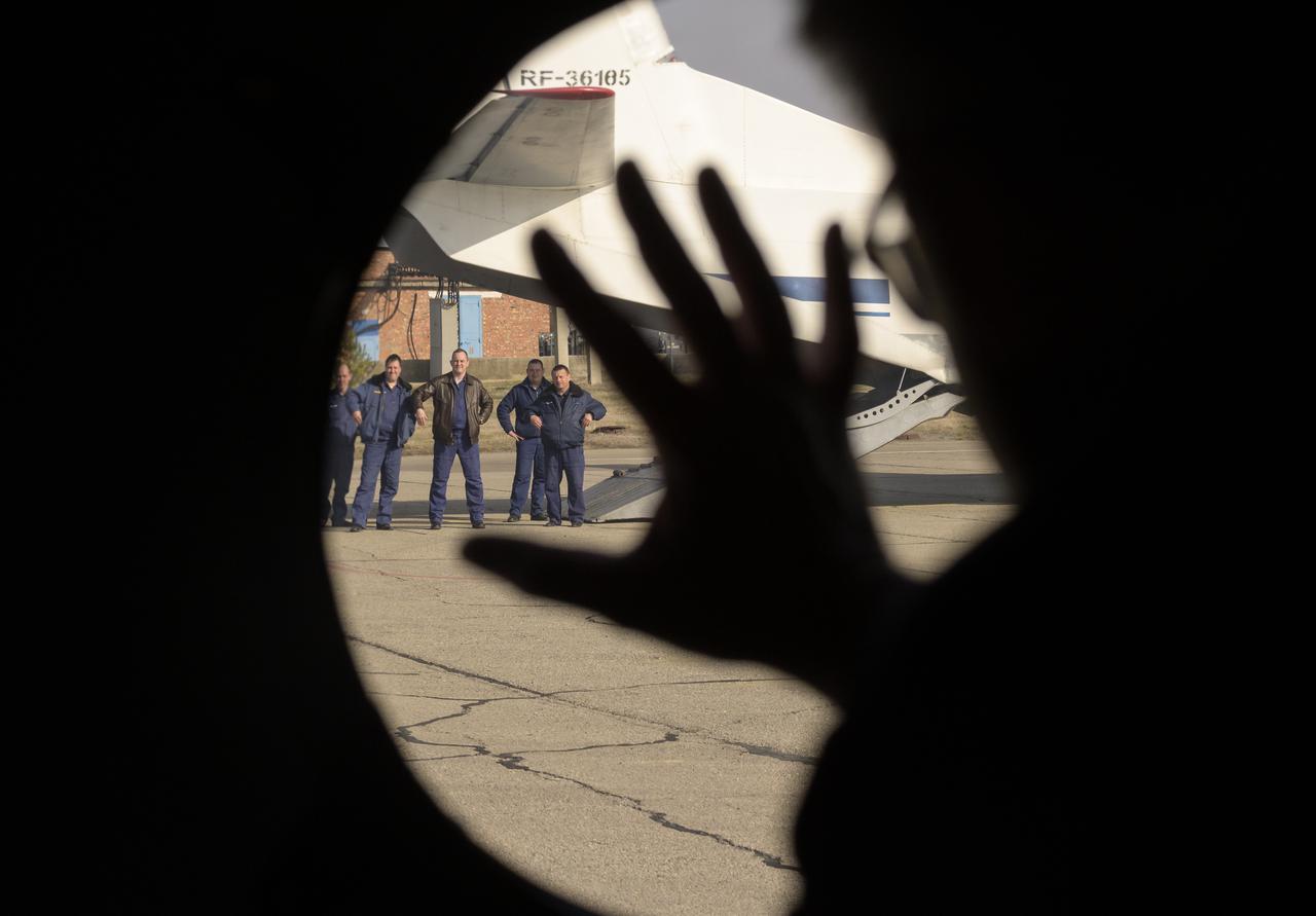 Deputy Head of the Search-and-Rescue Department of Rosaviatsiya (Russian Federal Air Transport Agency) Aleksey Lukiyanov waves farewell to colleagues as his helicopter departs the Zhezkazgan Airport in Kazakhstan for the Soyuz MS-17 landing of Expedition 64 crew members Kate Rubins of NASA, Sergey Ryzhikov and Sergey Kud-Sverchkov of Roscosmos, Saturday, April 17, 2021. Rubins, Ryzhikov and Kud-Sverchkov returned after 185 days in space having served as Expedition 63-64 crew members onboard the International Space Station. Photo Credit: NASA/Bill Ingalls