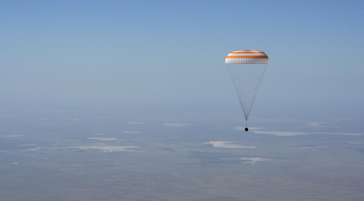 The Soyuz MS-17 spacecraft is seen as it lands in a remote area near the town of Zhezkazgan, Kazakhstan with Expedition 64 crew members Kate Rubins of NASA, Sergey Ryzhikov and Sergey Kud-Sverchkov of Roscosmos, Saturday, April 17, 2021. Rubins, Ryzhikov and Kud-Sverchkov returned after 185 days in space having served as Expedition 63-64 crew members onboard the International Space Station. Photo Credit: NASA/Bill Ingalls