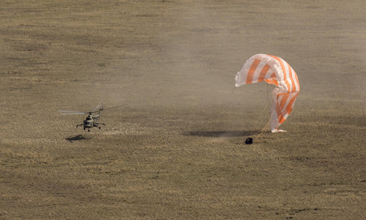 Russian Search and Rescue teams arrive at the Soyuz MS-17 spacecraft shortly after it landed in a remote area near the town of Zhezkazgan, Kazakhstan with Expedition 64 crew members Kate Rubins of NASA, Sergey Ryzhikov and Sergey Kud-Sverchkov of Roscosmos, Saturday, April 17, 2021. Rubins, Ryzhikov and Kud-Sverchkov returned after 185 days in space having served as Expedition 63-64 crew members onboard the International Space Station. Photo Credit: NASA/Bill Ingalls
