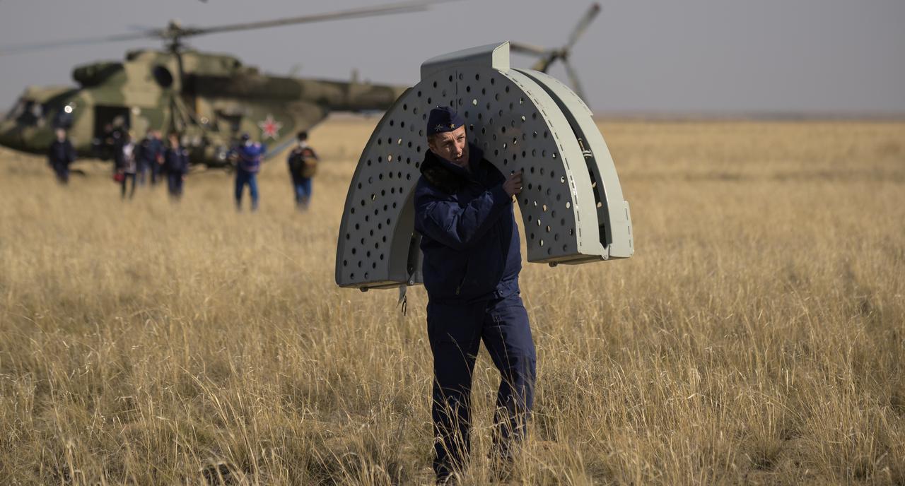Russian Search and Rescue teams arrive at the Soyuz MS-17 spacecraft shortly after it landed in a remote area near the town of Zhezkazgan, Kazakhstan with Expedition 64 crew members Kate Rubins of NASA, Sergey Ryzhikov and Sergey Kud-Sverchkov of Roscosmos, Saturday, April 17, 2021. Rubins, Ryzhikov and Kud-Sverchkov returned after 185 days in space having served as Expedition 63-64 crew members onboard the International Space Station. Photo Credit: NASA/Bill Ingalls
