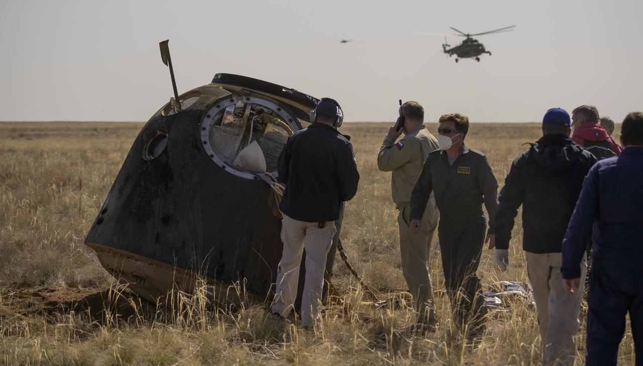 Russian Search and Rescue teams arrive at the Soyuz MS-17 spacecraft shortly after it landed in a remote area near the town of Zhezkazgan, Kazakhstan with Expedition 64 crew members Kate Rubins of NASA, Sergey Ryzhikov and Sergey Kud-Sverchkov of Roscosmos, Saturday, April 17, 2021. Rubins, Ryzhikov and Kud-Sverchkov returned after 185 days in space having served as Expedition 63-64 crew members onboard the International Space Station. Photo Credit: NASA/Bill Ingalls