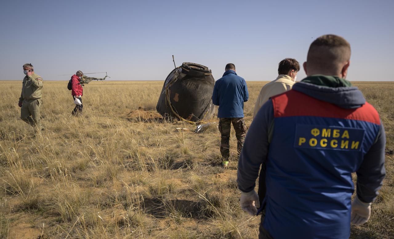 Russian Search and Rescue teams arrive at the Soyuz MS-17 spacecraft shortly after it landed in a remote area near the town of Zhezkazgan, Kazakhstan with Expedition 64 crew members Kate Rubins of NASA, Sergey Ryzhikov and Sergey Kud-Sverchkov of Roscosmos, Saturday, April 17, 2021. Rubins, Ryzhikov and Kud-Sverchkov returned after 185 days in space having served as Expedition 63-64 crew members onboard the International Space Station. Photo Credit: NASA/Bill Ingalls