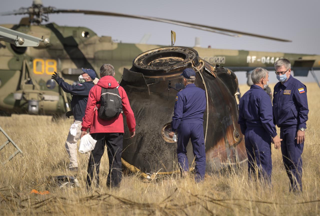 Russian Search and Rescue teams arrive at the Soyuz MS-17 spacecraft shortly after it landed in a remote area near the town of Zhezkazgan, Kazakhstan with Expedition 64 crew members Kate Rubins of NASA, Sergey Ryzhikov and Sergey Kud-Sverchkov of Roscosmos, Saturday, April 17, 2021. Rubins, Ryzhikov and Kud-Sverchkov returned after 185 days in space having served as Expedition 63-64 crew members onboard the International Space Station. Photo Credit: NASA/Bill Ingalls