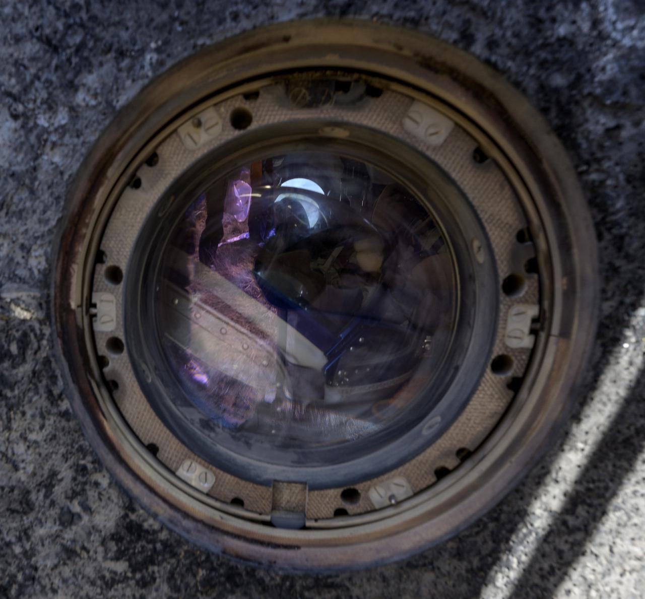 A window of the Soyuz MS-17 spacecraft is seen after the capsule landed in a remote area near the town of Zhezkazgan, Kazakhstan with Expedition 64 crew members Kate Rubins of NASA, Sergey Ryzhikov and Sergey Kud-Sverchkov of Roscosmos, Saturday, April 17, 2021. Rubins, Ryzhikov and Kud-Sverchkov returned after 185 days in space having served as Expedition 63-64 crew members onboard the International Space Station. Photo Credit: NASA/Bill Ingalls