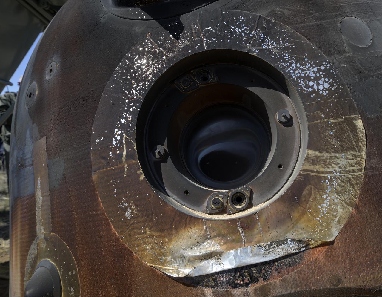 A window of the Soyuz MS-17 spacecraft is seen after the capsule landed in a remote area near the town of Zhezkazgan, Kazakhstan with Expedition 64 crew members Kate Rubins of NASA, Sergey Ryzhikov and Sergey Kud-Sverchkov of Roscosmos, Saturday, April 17, 2021. Rubins, Ryzhikov and Kud-Sverchkov returned after 185 days in space having served as Expedition 63-64 crew members onboard the International Space Station. Photo Credit: NASA/Bill Ingalls