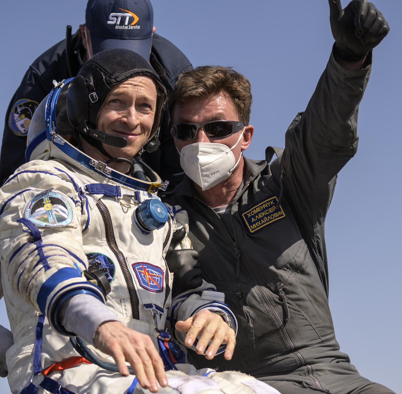 Expedition 64 Roscosmos cosmonaut Sergey Ryzhikov is helped out of the Soyuz MS-17 spacecraft just minutes after he, Roscosmos cosmonaut Sergey Kud-Sverchkov, and NASA astronaut Kate Rubins landed in a remote area near the town of Zhezkazgan, Kazakhstan on Saturday, April 17, 2021. Rubins, Ryzhikov and Kud-Sverchkov returned after 185 days in space having served as Expedition 63-64 crew members onboard the International Space Station. Photo Credit: NASA/Bill Ingalls