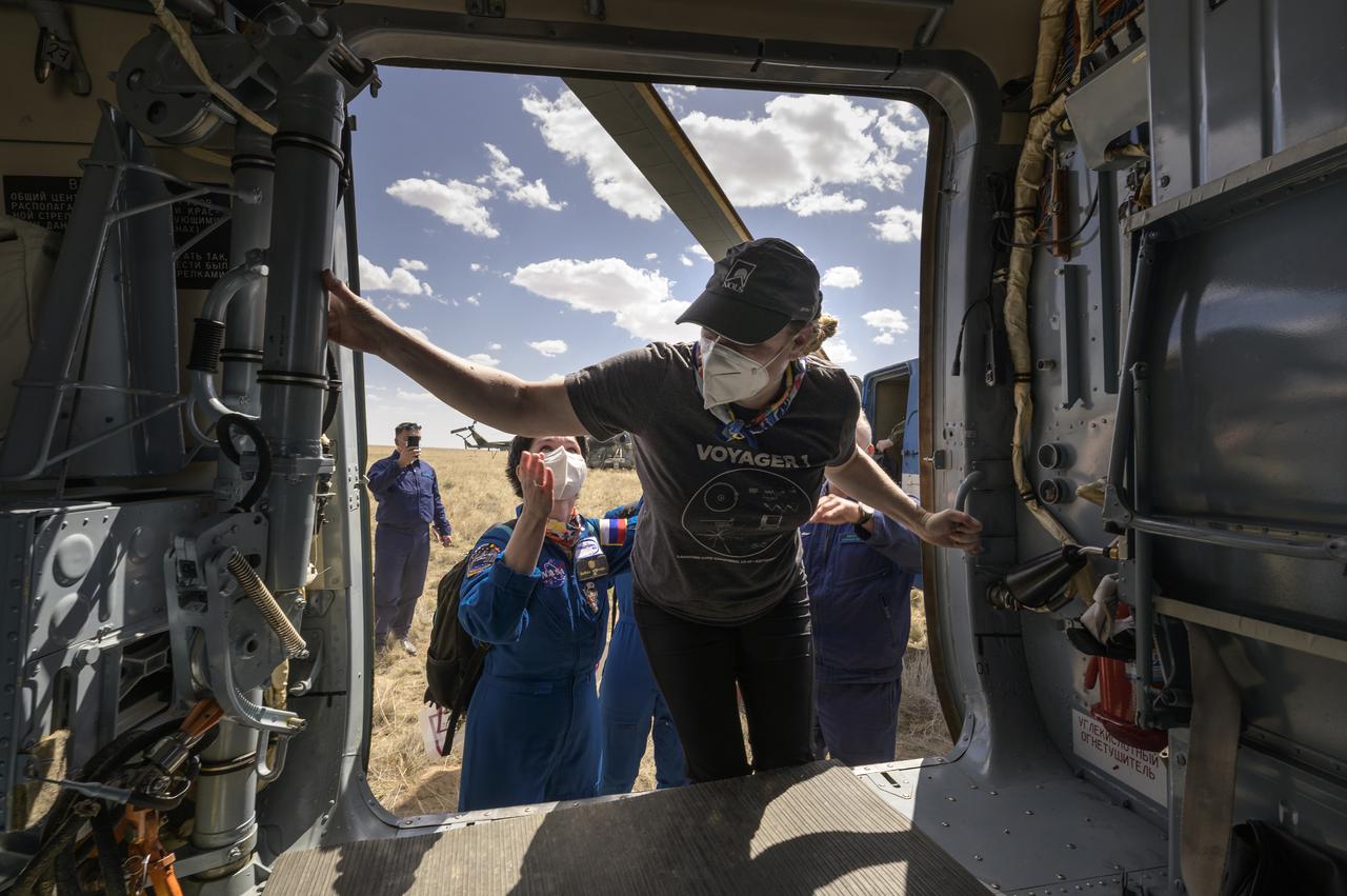 Expedition 64 NASA astronaut Kate Rubins boards a Russian MI-8 helicopter to take her to Karaganda after she, and Roscosmos cosmonauts Sergey Ryzhikov and Sergey Kud-Sverchkov, landed in their Soyuz MS-17 spacecraft near the town of Zhezkazgan, Kazakhstan on Saturday, April 17, 2021. Rubins, Ryzhikov and Kud-Sverchkov returned after 185 days in space having served as Expedition 63-64 crew members onboard the International Space Station. Photo Credit: NASA/Bill Ingalls