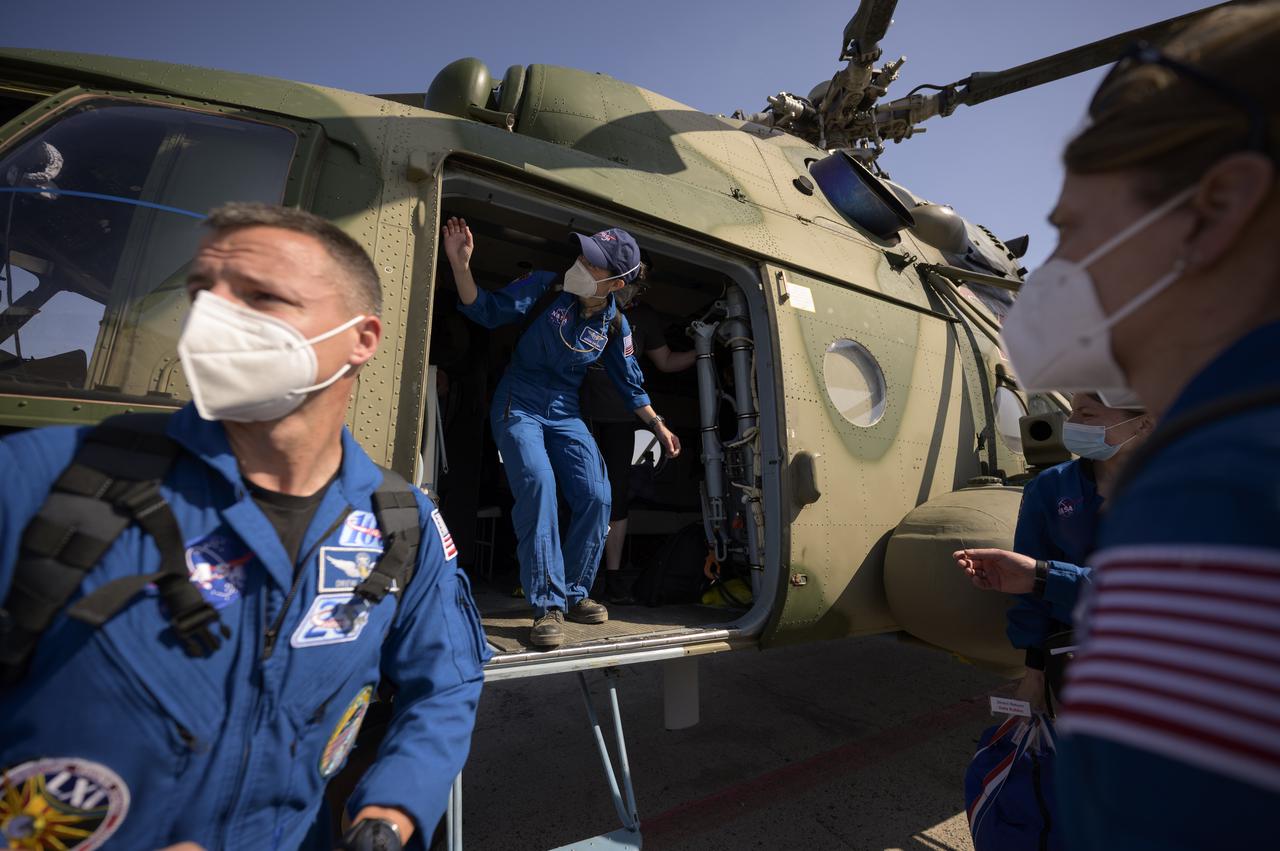 NASA Flight Surgeon Natacha Chough exits the Russian MI-8 helicopter in advance of NASA astronaut Kate Rubins, after Rubins, Roscosmos cosmonauts Sergey Ryzhikov and Sergey Kud-Sverchkov landed in their Soyuz MS-17 spacecraft in a remote area near the town of Zhezkazgan, Kazakhstan on Saturday, April 17, 2021. Rubins, Ryzhikov and Kud-Sverchkov returned after 185 days in space having served as Expedition 63-64 crew members onboard the International Space Station. Photo Credit: NASA/Bill Ingalls