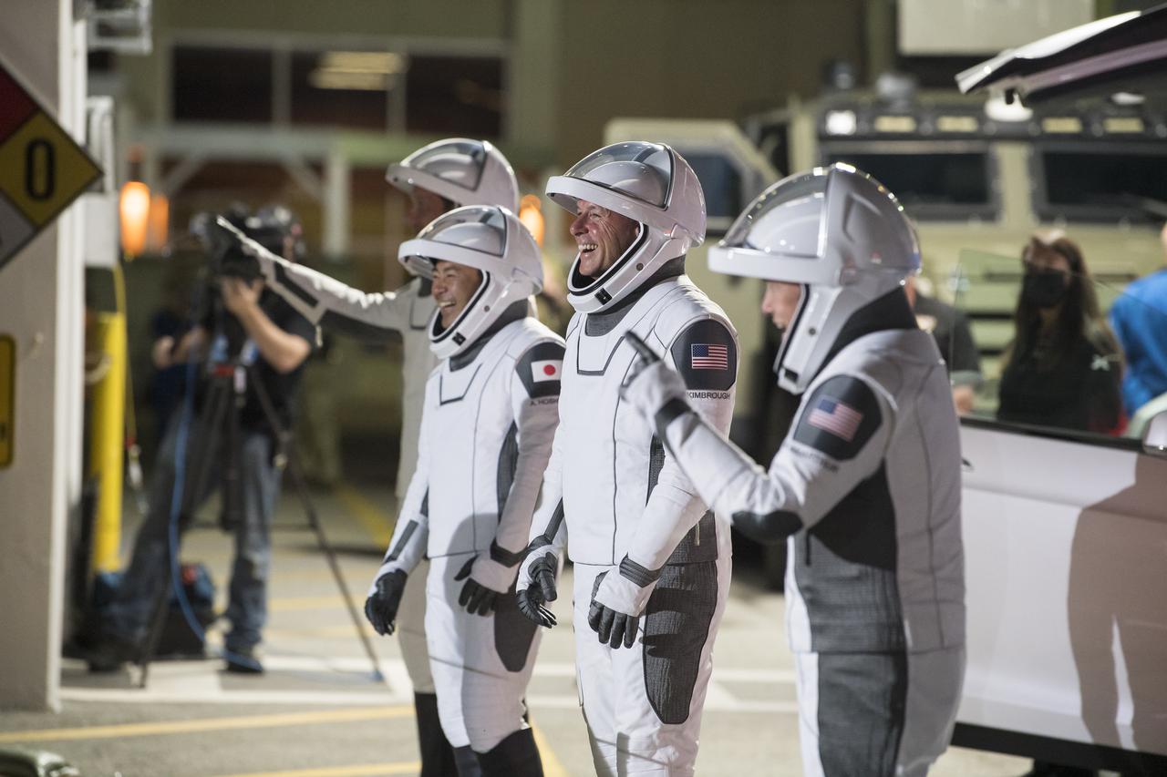 From left to right, ESA (European Space Agency) astronaut Thomas Pesquet, Japan Aerospace Exploration Agency (JAXA) astronaut Akihiko Hoshide, and NASA astronauts Shane Kimbrough and Megan McArthur, are seen as they prepare to depart the Neil  A. Armstrong Operations and Checkout Building for Launch Complex 39A during a dress rehearsal prior to the Crew-2 mission launch, Sunday, April 18, 2021, at NASA’s Kennedy Space Center in Florida. NASA’s SpaceX Crew-2 mission is the second operational mission of the SpaceX Crew Dragon spacecraft and Falcon 9 rocket to the International Space Station as part of the agency’s Commercial Crew Program. Kimbrough, McArthur, Pesquet, and Hoshide are scheduled to launch at 6:11 a.m. ET on Thursday, April 22, from Launch Complex 39A at the Kennedy Space Center. Photo Credit: (NASA/Aubrey Gemignani)