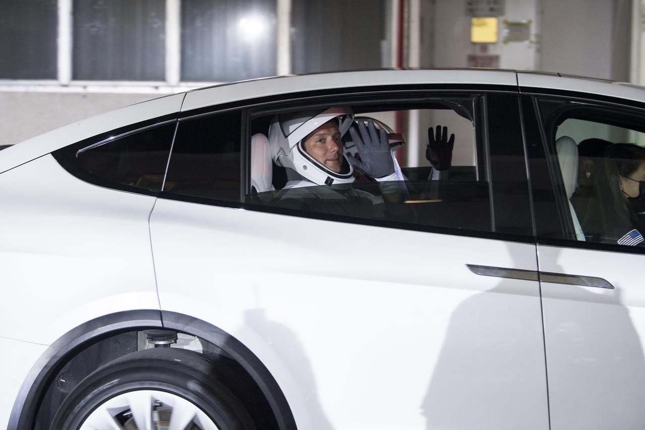 ESA (European Space Agency) astronaut Thomas Pesquet is seen as he and crew mates NASA astronauts Shane Kimbrough and Megan McArthur, and Japan Aerospace Exploration Agency (JAXA) astronaut Akihiko Hoshide depart the Neil  A. Armstrong Operations and Checkout Building for Launch Complex 39A during a dress rehearsal prior to the Crew-2 mission launch, Sunday, April 18, 2021, at NASA’s Kennedy Space Center in Florida. NASA’s SpaceX Crew-2 mission is the second operational mission of the SpaceX Crew Dragon spacecraft and Falcon 9 rocket to the International Space Station as part of the agency’s Commercial Crew Program. Kimbrough, McArthur, Pesquet, and Hoshide are scheduled to launch at 6:11 a.m. ET on Thursday, April 22, from Launch Complex 39A at the Kennedy Space Center. Photo Credit: (NASA/Aubrey Gemignani)