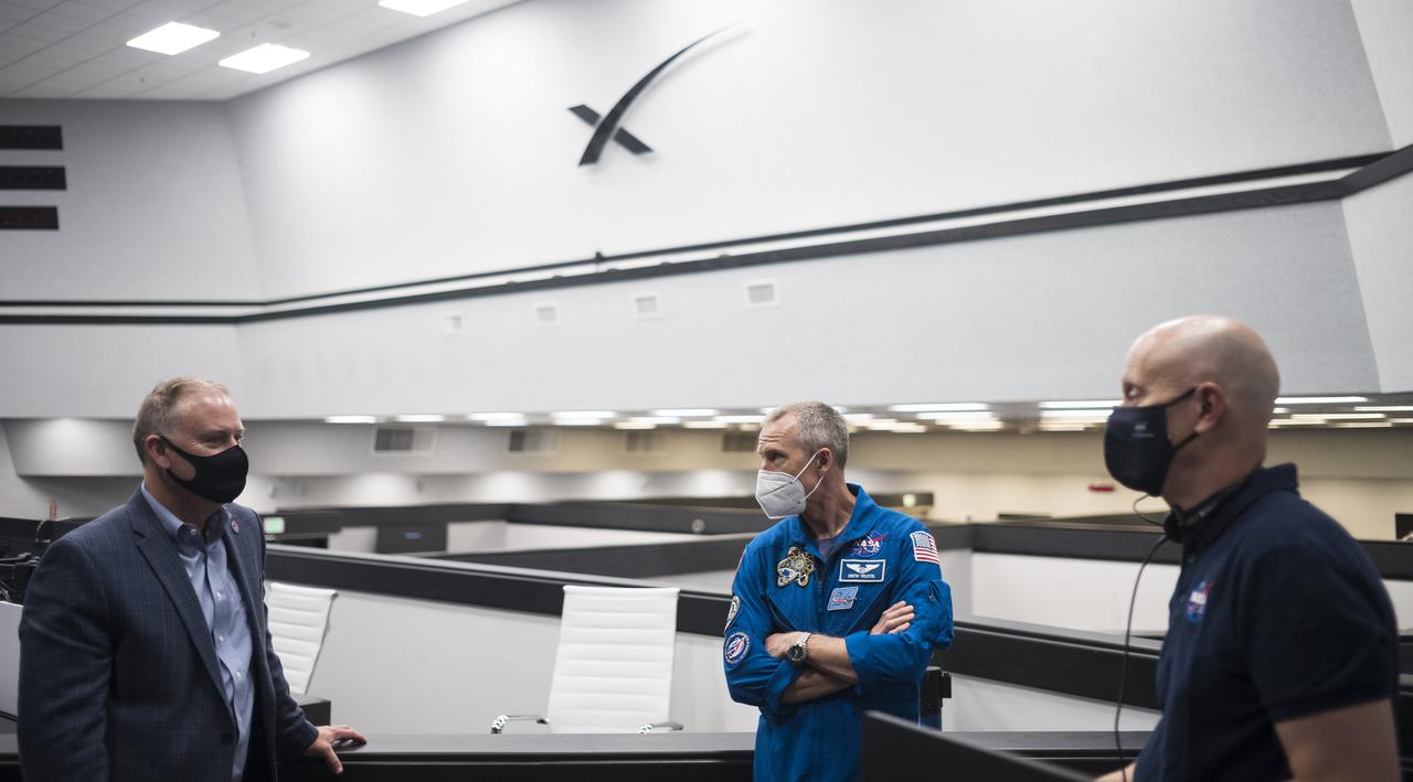 Andrew Feustel, deputy chief of the Astronaut Office, left, Stephen Koerner, director of the Flight Operations Directorate at NASA’s Johnson Space Center, center, and Norm Knight, deputy director of Flight Operations at NASA's Johnson Space Center, are seen during a dress rehearsal in preparation for the launch of a SpaceX Falcon 9 rocket carrying the company's Crew Dragon spacecraft on NASA’s SpaceX Crew-2 mission with NASA astronauts Shane Kimbrough and Megan McArthur, ESA (European Space Agency) astronaut Thomas Pesquet, and Japan Aerospace Exploration Agency (JAXA) astronaut Akihiko Hoshide onboard, Sunday, April 18, 2021, in firing room four of the Launch Control Center at NASA’s Kennedy Space Center in Florida. NASA’s SpaceX Crew-2 mission is the second operational mission of the SpaceX Crew Dragon spacecraft and Falcon 9 rocket to the International Space Station as part of the agency’s Commercial Crew Program. Kimbrough, McArthur, Pesquet, and Hoshide are scheduled to launch at 6:11 a.m. ET on Thursday, April 22, from Launch Complex 39A at the Kennedy Space Center. Photo Credit: (NASA/Joel Kowsky)