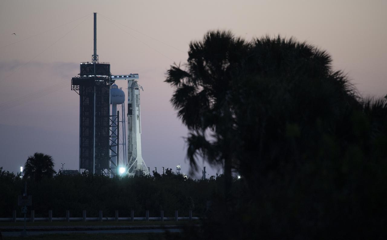 A SpaceX Falcon 9 rocket with the company's Crew Dragon spacecraft onboard is seen at sunrise on the launch pad at Launch Complex 39A as preparations continue for the Crew-2 mission, Thursday, April 22, 2021, at NASA’s Kennedy Space Center in Florida. NASA’s SpaceX Crew-2 mission is the second crew rotation mission of the SpaceX Crew Dragon spacecraft and Falcon 9 rocket to the International Space Station as part of the agency’s Commercial Crew Program. NASA astronauts Shane Kimbrough and Megan McArthur, ESA (European Space Agency) astronaut Thomas Pesquet, and Japan Aerospace Exploration Agency (JAXA) astronaut Akihiko Hoshide are scheduled to launch at 5:49 a.m. EDT on Friday, April 23, from Launch Complex 39A at the Kennedy Space Center. Photo Credit: (NASA/Joel Kowsky)