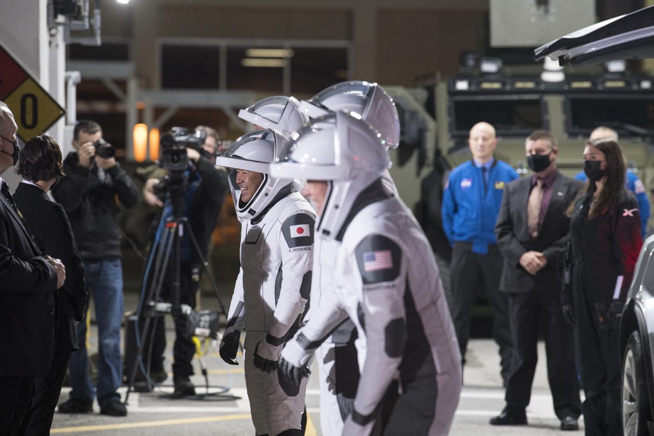 From left to right, ESA (European Space Agency) astronaut Thomas Pesquet, Japan Aerospace Exploration Agency (JAXA) astronaut Akihiko Hoshide, and NASA astronauts Shane Kimbrough and Megan McArthur, are seen as they prepare to depart the Neil  A. Armstrong Operations and Checkout Building for Launch Complex 39A to board the SpaceX Crew Dragon spacecraft for the Crew-2 mission launch, Friday, April 23, 2021, at NASA’s Kennedy Space Center in Florida. NASA’s SpaceX Crew-2 mission is the second crew rotation mission of the SpaceX Crew Dragon spacecraft and Falcon 9 rocket to the International Space Station as part of the agency’s Commercial Crew Program. Kimbrough, McArthur, Pesquet, and Hoshide are scheduled to launch at 5:49 a.m. EDT. Photo Credit: (NASA/Aubrey Gemignani)