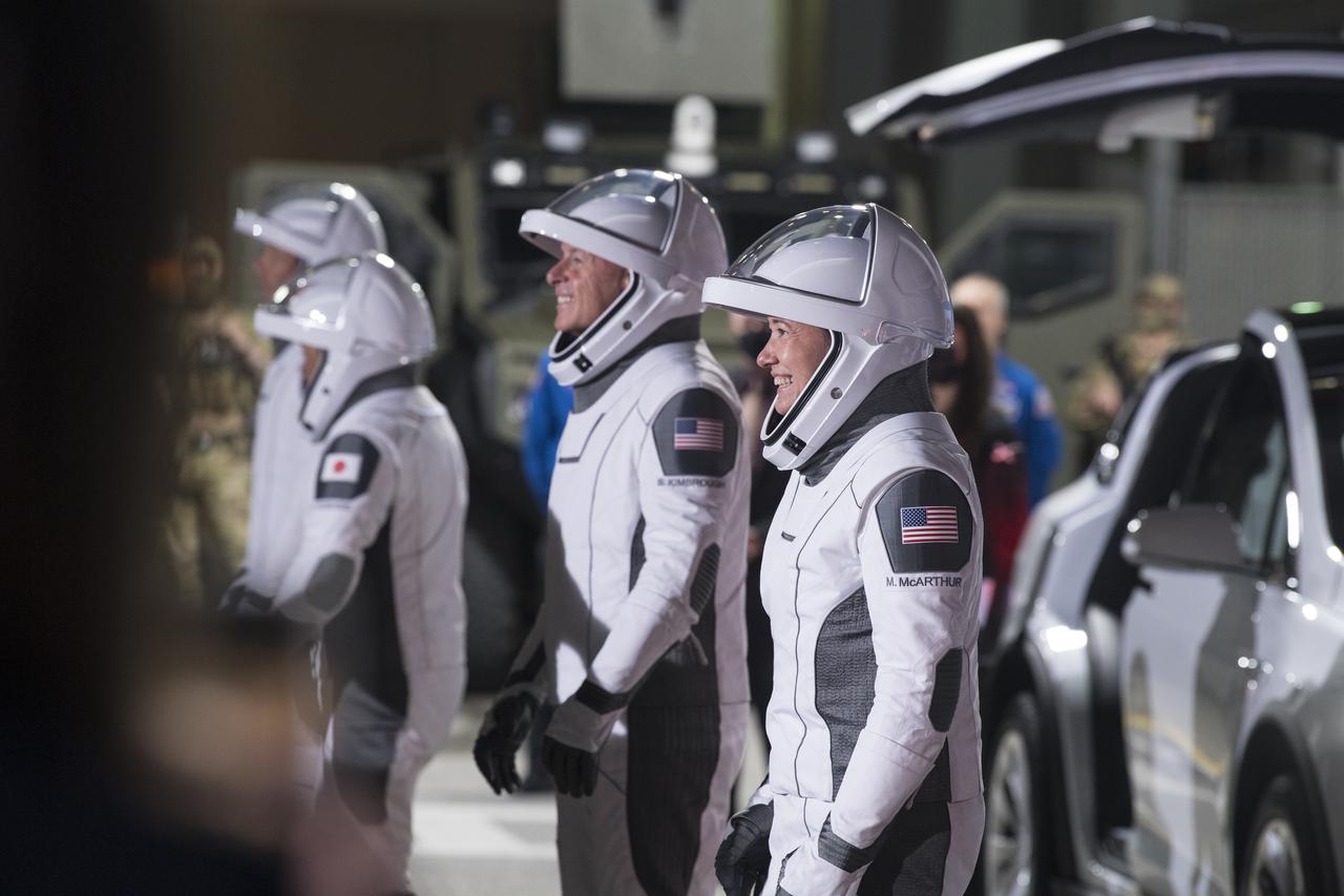 From left to right, ESA (European Space Agency) astronaut Thomas Pesquet, Japan Aerospace Exploration Agency (JAXA) astronaut Akihiko Hoshide, and NASA astronauts Shane Kimbrough and Megan McArthur, are seen as they prepare to depart the Neil  A. Armstrong Operations and Checkout Building for Launch Complex 39A to board the SpaceX Crew Dragon spacecraft for the Crew-2 mission launch, Friday, April 23, 2021, at NASA’s Kennedy Space Center in Florida. NASA’s SpaceX Crew-2 mission is the second crew rotation mission of the SpaceX Crew Dragon spacecraft and Falcon 9 rocket to the International Space Station as part of the agency’s Commercial Crew Program. Kimbrough, McArthur, Pesquet, and Hoshide are scheduled to launch at 5:49 a.m. EDT. Photo Credit: (NASA/Aubrey Gemignani)