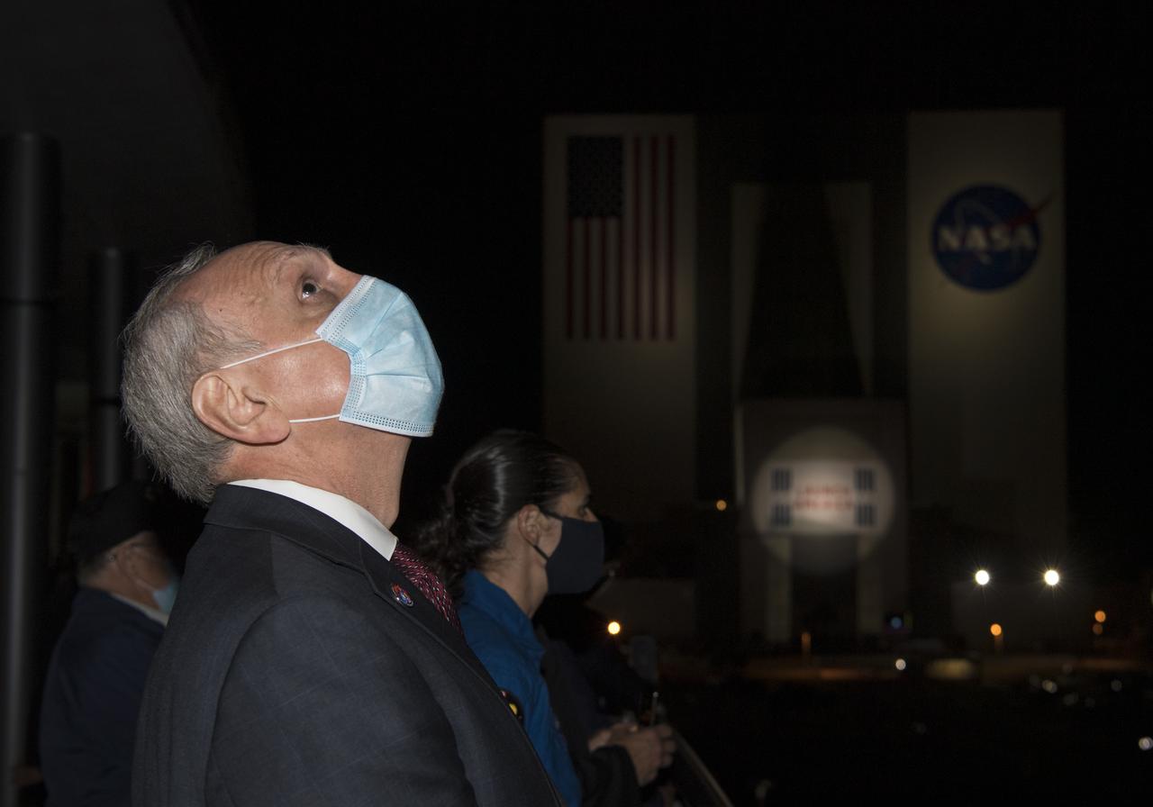 Acting NASA Administrator Steve Jurczyk watches the launch of a SpaceX Falcon 9 rocket carrying the company's Crew Dragon spacecraft on NASA’s SpaceX Crew-2 mission with NASA astronauts Shane Kimbrough and Megan McArthur, ESA (European Space Agency) astronaut Thomas Pesquet, and Japan Aerospace Exploration Agency (JAXA) astronaut Akihiko Hoshide onboard, Friday, April 23, 2021, from the balcony of Operations Support Building II at NASA’s Kennedy Space Center in Florida. NASA’s SpaceX Crew-2 mission is the first crew rotation mission of the SpaceX Crew Dragon spacecraft and Falcon 9 rocket to the International Space Station as part of the agency’s Commercial Crew Program. Kimbrough, McArthur, Pesquet, and Hoshide launched at 5:49 a.m. EDT from Launch Complex 39A at the Kennedy Space Center to begin a six month mission onboard the orbital outpost. Photo Credit: (NASA/Aubrey Gemignani)