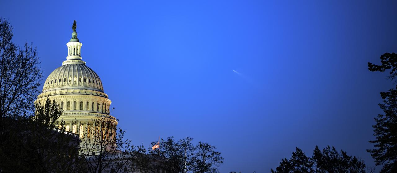 A SpaceX Falcon 9 rocket carrying the company's Crew Dragon spacecraft is seen to the right of the U.S. Capitol Building in Washington as it is launches NASA’s SpaceX Crew-2 mission to the International Space Station with NASA astronauts Shane Kimbrough and Megan McArthur, ESA (European Space Agency) astronaut Thomas Pesquet, and Japan Aerospace Exploration Agency (JAXA) astronaut Akihiko Hoshide onboard, Friday, April 23, 2021, from Cape Canaveral, Florida. NASA’s SpaceX Crew-2 mission is the second crew rotation mission of the SpaceX Crew Dragon spacecraft and Falcon 9 rocket to the International Space Station as part of the agency’s Commercial Crew Program. Kimbrough, McArthur, Pesquet, and Hoshide launched at 5:49 a.m. EDT from Launch Complex 39A at the Kennedy Space Center to begin a six month mission onboard the orbital outpost. Photo Credit: (NASA/Bill Ingalls)