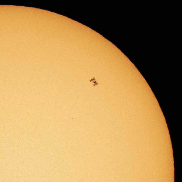 The International Space Station, with a crew of seven aboard, is seen in silhouette as it transits the sun at roughly five miles per second, Friday, April 23, 2021, as seen from Nottingham, Maryland. Aboard are: NASA astronauts Shannon Walker, Mike Hopkins, Victor Glover, Mark Vande Hei; Roscosmos cosmonauts Oleg Novitskiy, Pyotr Dubrov; and Japan Aerospace Exploration Agency (JAXA) astronaut Soichi Noguchi. Joining the crew aboard station tomorrow will be Crew-2 mission crew members: NASA astronauts Shane Kimbrough and Megan McArthur, JAXA astronaut Akihiko Hoshide, and ESA (European Space Agency) astronaut Thomas Pesquet. Photo Credit: (NASA/Bill Ingalls)