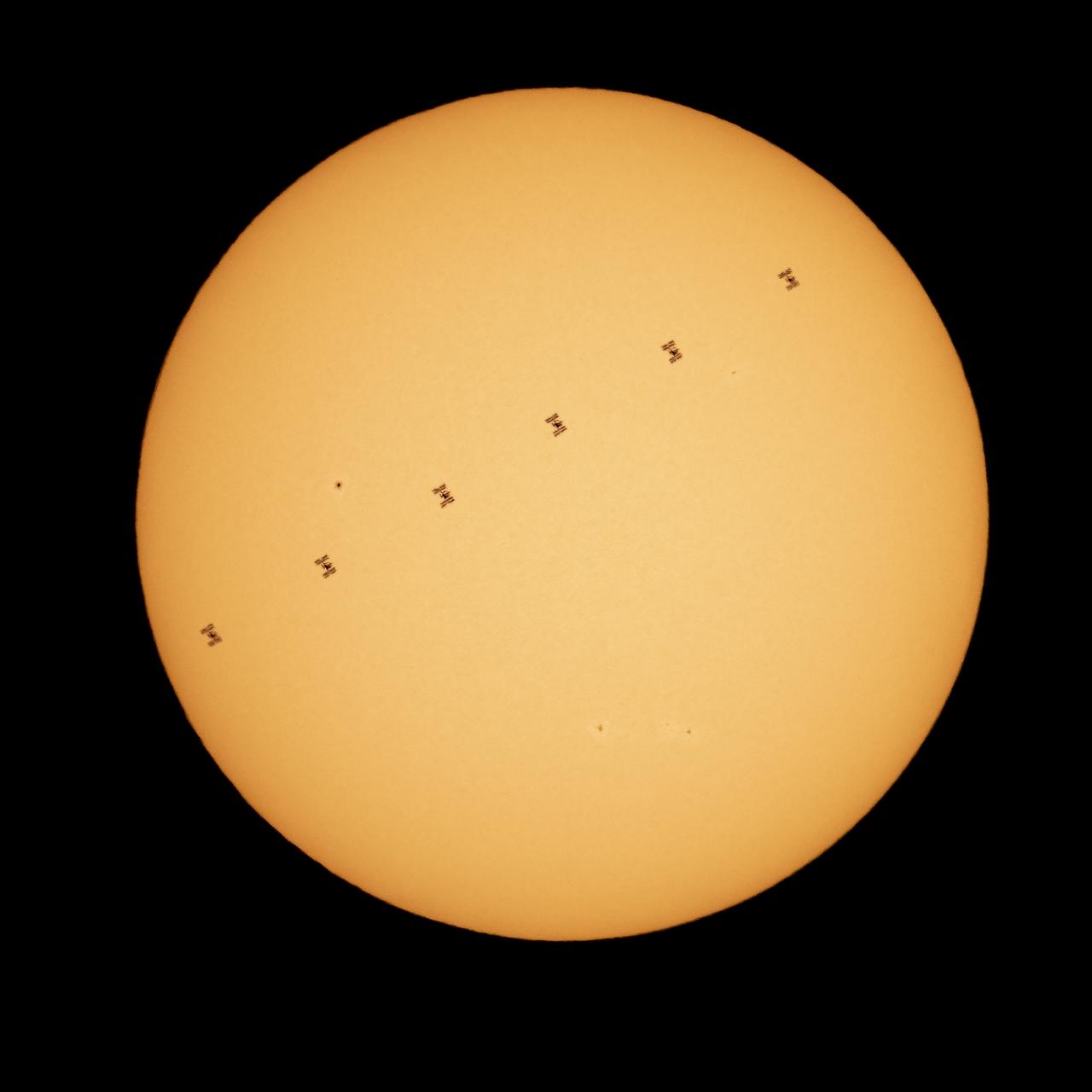 This composite image made from six frames shows the International Space Station, with a crew of seven aboard, in silhouette as it transits the sun at roughly five miles per second, Friday, April 23, 2021, as seen from Nottingham, Maryland. Aboard are: NASA astronauts Shannon Walker, Mike Hopkins, Victor Glover, Mark Vande Hei; Roscosmos cosmonauts Oleg Novitskiy, Pyotr Dubrov; and Japan Aerospace Exploration Agency (JAXA) astronaut Soichi Noguchi. Joining the crew aboard station tomorrow will be Crew-2 mission crew members: NASA astronauts Shane Kimbrough and Megan McArthur, JAXA astronaut Akihiko Hoshide, and ESA (European Space Agency) astronaut Thomas Pesquet. Photo Credit: (NASA/Bill Ingalls)