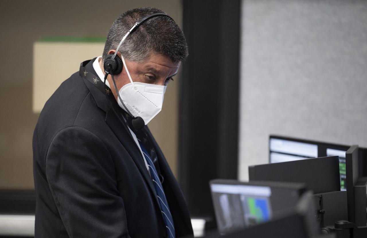 Richard Jones, manager of the Mission Management and Integration Office for NASA's Commercial Crew Program, monitors the countdown of the launch of a SpaceX Falcon 9 rocket carrying the company's Crew Dragon spacecraft on NASA’s SpaceX Crew-2 mission with NASA astronauts Shane Kimbrough and Megan McArthur, ESA (European Space Agency) astronaut Thomas Pesquet, and Japan Aerospace Exploration Agency (JAXA) astronaut Akihiko Hoshide onboard, Friday, April 23, 2021, in firing room four of the Launch Control Center at NASA’s Kennedy Space Center in Florida. NASA’s SpaceX Crew-2 mission is the second crew rotation mission of the SpaceX Crew Dragon spacecraft and Falcon 9 rocket to the International Space Station as part of the agency’s Commercial Crew Program. Kimbrough, McArthur, Pesquet, and Hoshide launched at 5:49 a.m. EDT, from Launch Complex 39A at the Kennedy Space Center. Photo Credit: (NASA/Joel Kowsky)